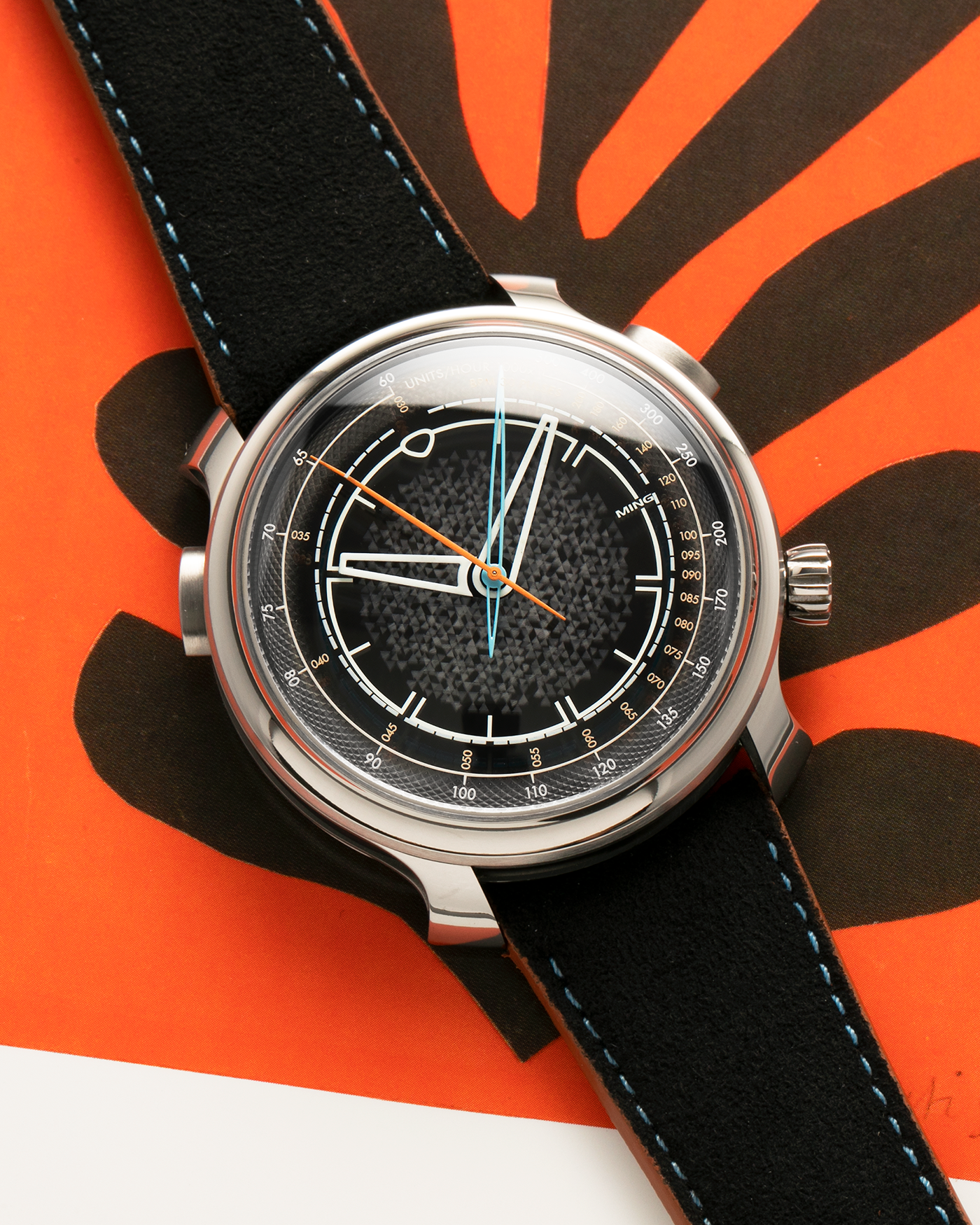 Brand: MING
Year: 2022
Model: 20.01 Series II ‘Special Projects Cave’, Limited to 50 pieces
Material: Grade 5 Titanium Case, DLC-Coated Case Band, Grade 2 Titanium Dial Base
Movement: Agenhor for MING Agengraphe Cal. 6361.M1, Manual-Winding
Case Dimensions: 41.5mm x 14.2mm (Lug-to-Lug 46mm)
Lug Width: 22mm
Strap: Jean Rousseau Black Suede Leather Strap with Orange Underlining for MING with Signed Grade 5 Titanium Keeperless Flying Blade Buckle