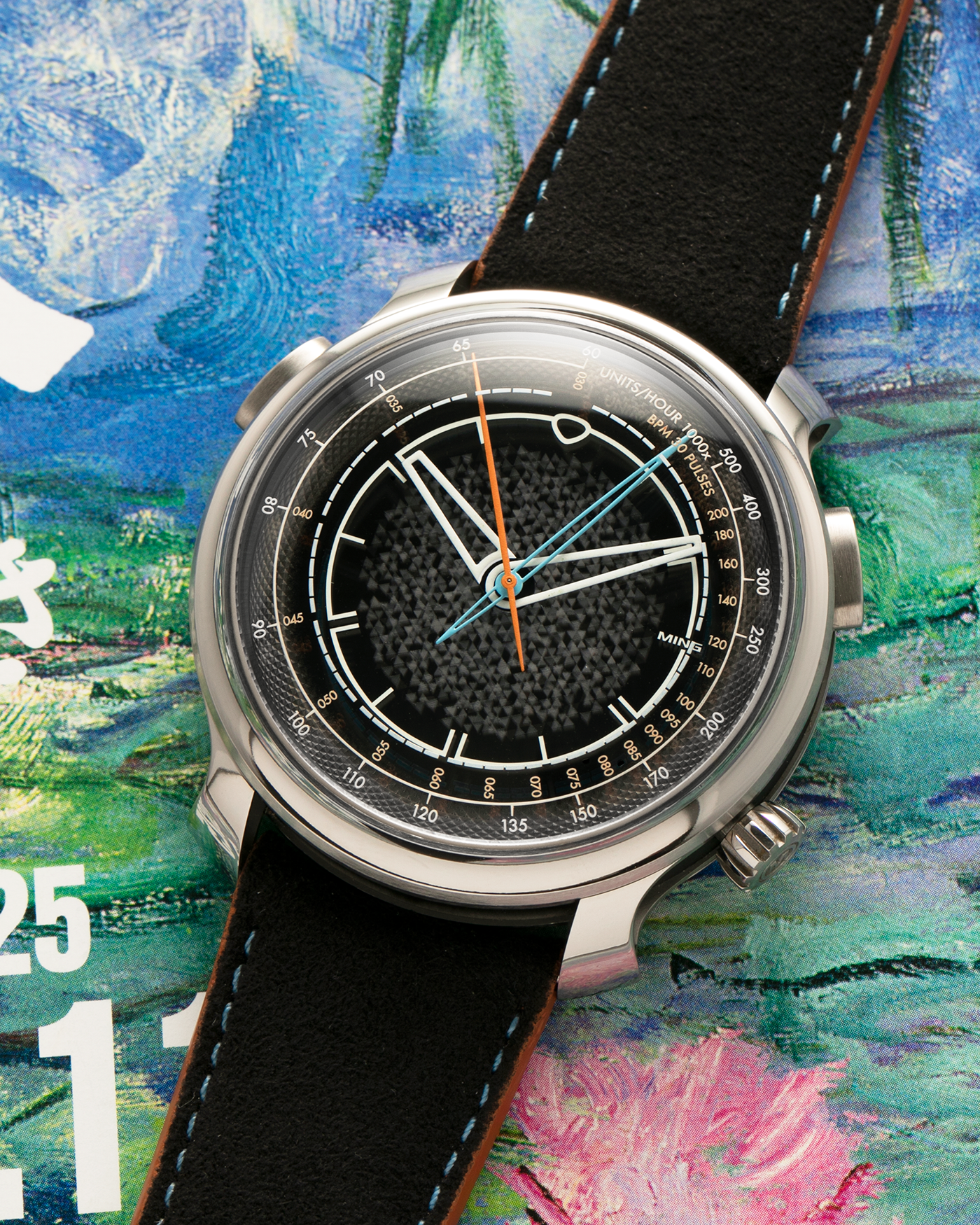 Brand: MING
Year: 2022
Model: 20.01 Series II ‘Special Projects Cave’, Limited to 50 pieces
Material: Grade 5 Titanium Case, DLC-Coated Case Band, Grade 2 Titanium Dial Base
Movement: Agenhor for MING Agengraphe Cal. 6361.M1, Manual-Winding
Case Dimensions: 41.5mm x 14.2mm (Lug-to-Lug 46mm)
Lug Width: 22mm
Strap: Jean Rousseau Black Suede Leather Strap with Orange Underlining for MING with Signed Grade 5 Titanium Keeperless Flying Blade Buckle