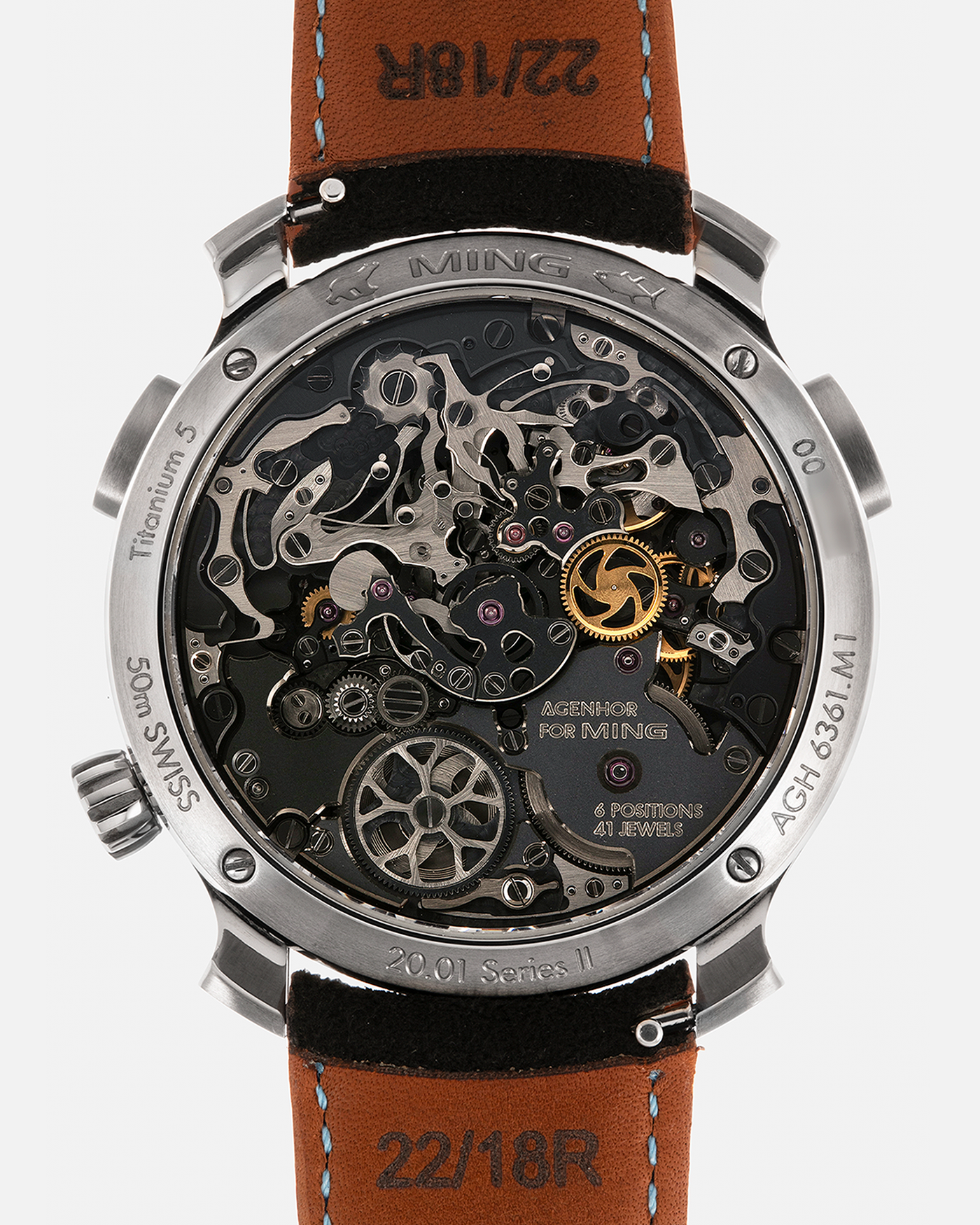 Brand: MING
Year: 2022
Model: 20.01 Series II ‘Special Projects Cave’, Limited to 50 pieces
Material: Grade 5 Titanium Case, DLC-Coated Case Band, Grade 2 Titanium Dial Base
Movement: Agenhor for MING Agengraphe Cal. 6361.M1, Manual-Winding
Case Dimensions: 41.5mm x 14.2mm (Lug-to-Lug 46mm)
Lug Width: 22mm
Strap: Jean Rousseau Black Suede Leather Strap with Orange Underlining for MING with Signed Grade 5 Titanium Keeperless Flying Blade Buckle