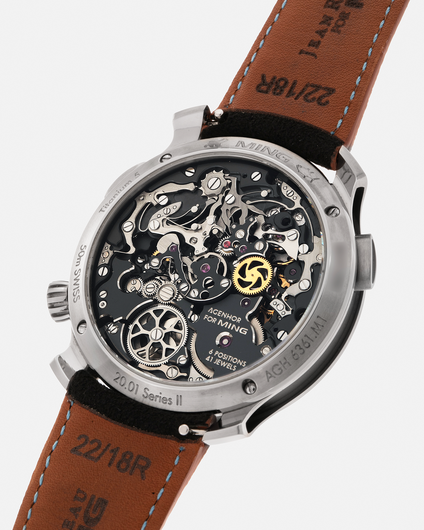 Brand: MING
Year: 2022
Model: 20.01 Series II ‘Special Projects Cave’, Limited to 50 pieces
Material: Grade 5 Titanium Case, DLC-Coated Case Band, Grade 2 Titanium Dial Base
Movement: Agenhor for MING Agengraphe Cal. 6361.M1, Manual-Winding
Case Dimensions: 41.5mm x 14.2mm (Lug-to-Lug 46mm)
Lug Width: 22mm
Strap: Jean Rousseau Black Suede Leather Strap with Orange Underlining for MING with Signed Grade 5 Titanium Keeperless Flying Blade Buckle