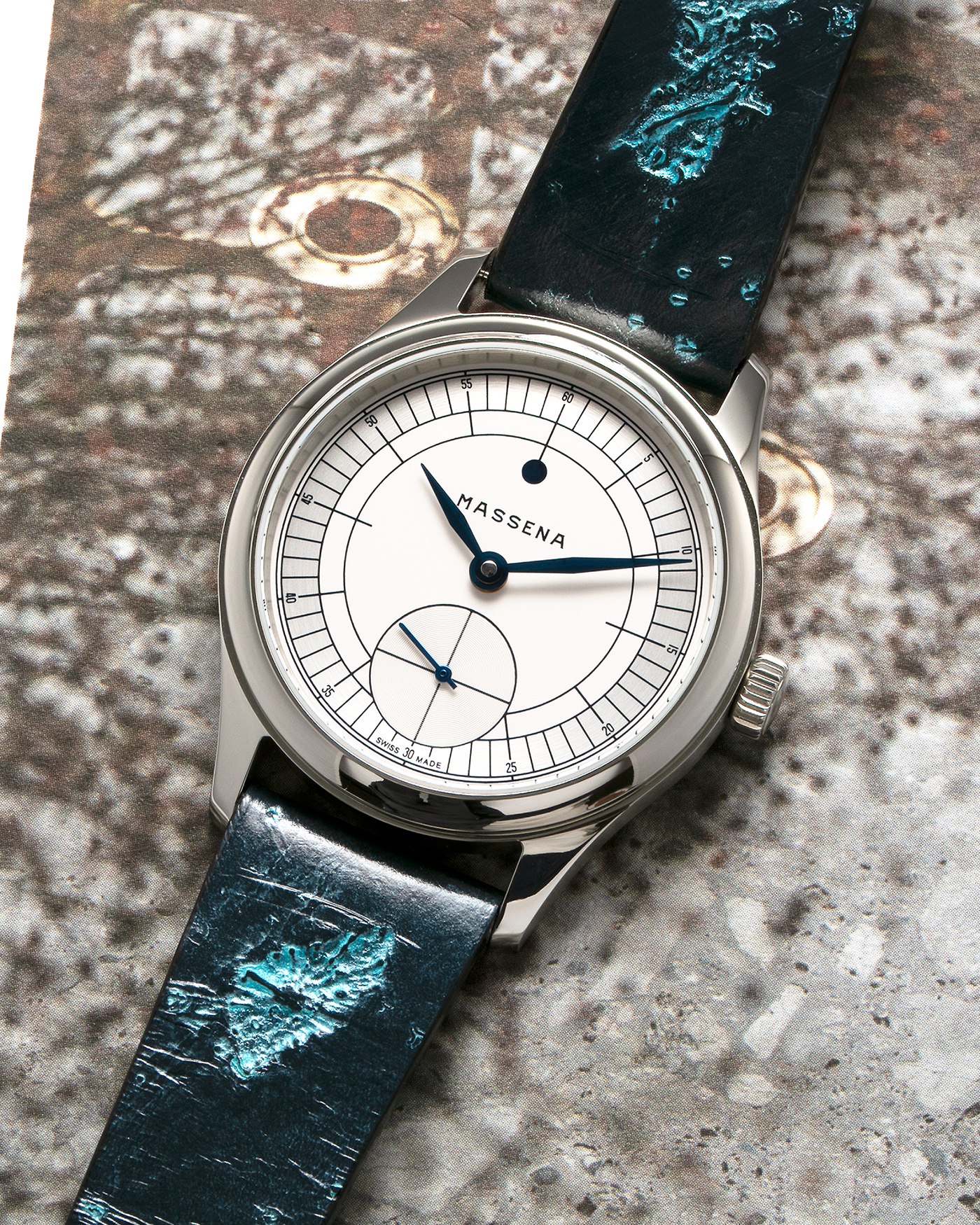 Brand: Massena LAB Year: 2023 Model: Massena LAB x Raúl Pagès Magraph, Limited Edition of 99 Pieces Material: Stainless Steel Movement: Massena LAB Cal. M660 Designed by Raúl Pagès, Manual-Winding Case Diameter: 38.5mm Lug Width: 20mm Strap: Jean Rosseau Paris Sustainable Sturgeon Skin Strap with Stainless Steel Tang Buckle, additional Black Textured Calf Leather Strap.