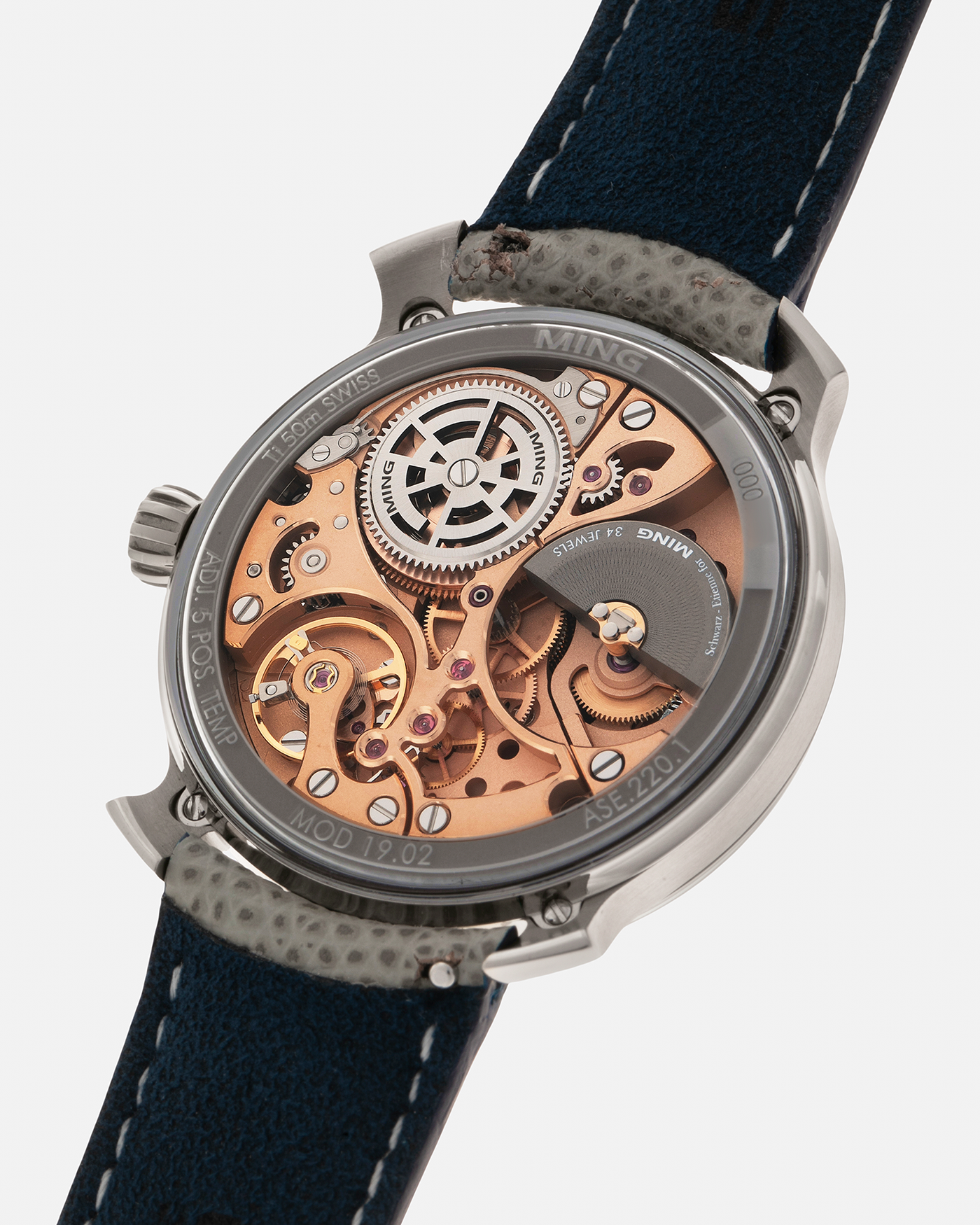 Brand: MING
Year: 2020
Model: 19.02 World Timer
Material: Grade 5 Titanium
Movement: Schwarz-Etienne for MING Cal. ASE 220.1, Manual-Winding
Case Dimensions: 39mm x 10.9mm (Lug-to-Lug 43.9mm)
Lug Width: 20mm
Strap: Jean Rousseau for MING Grey Calf Leather Strap with Signed Grade 5 Titanium Tang Buckle