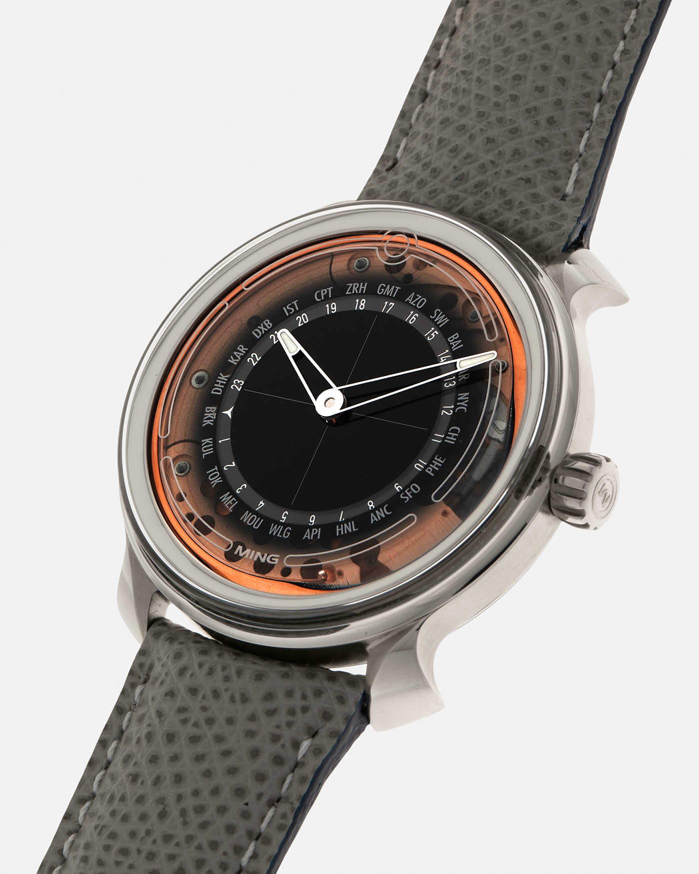 Brand: MING
Year: 2020
Model: 19.02 World Timer
Material: Grade 5 Titanium
Movement: Schwarz-Etienne for MING Cal. ASE 220.1, Manual-Winding
Case Dimensions: 39mm x 10.9mm (Lug-to-Lug 43.9mm)
Lug Width: 20mm
Strap: Jean Rousseau for MING Grey Calf Leather Strap with Signed Grade 5 Titanium Tang Buckle