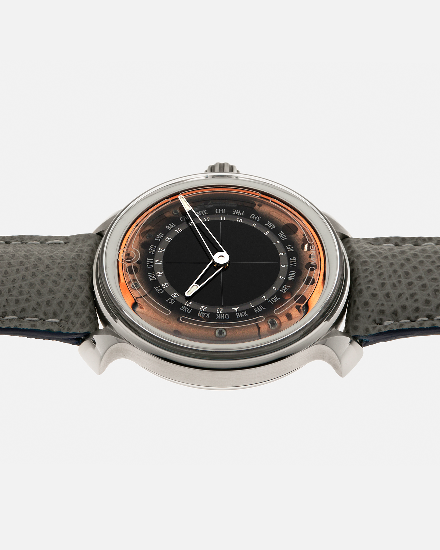 Brand: MING
Year: 2020
Model: 19.02 World Timer
Material: Grade 5 Titanium
Movement: Schwarz-Etienne for MING Cal. ASE 220.1, Manual-Winding
Case Dimensions: 39mm x 10.9mm (Lug-to-Lug 43.9mm)
Lug Width: 20mm
Strap: Jean Rousseau for MING Grey Calf Leather Strap with Signed Grade 5 Titanium Tang Buckle