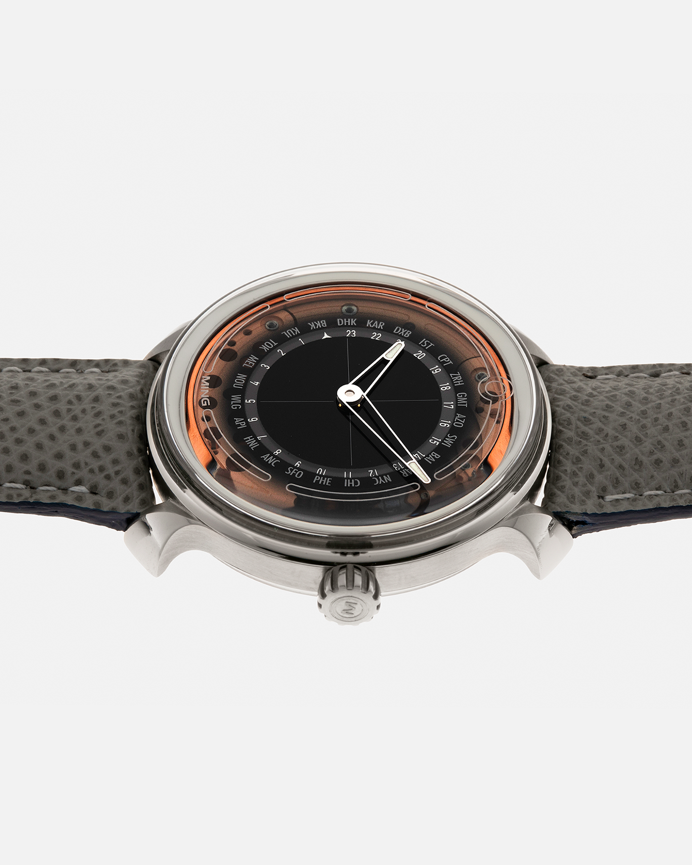 Brand: MING
Year: 2020
Model: 19.02 World Timer
Material: Grade 5 Titanium
Movement: Schwarz-Etienne for MING Cal. ASE 220.1, Manual-Winding
Case Dimensions: 39mm x 10.9mm (Lug-to-Lug 43.9mm)
Lug Width: 20mm
Strap: Jean Rousseau for MING Grey Calf Leather Strap with Signed Grade 5 Titanium Tang Buckle