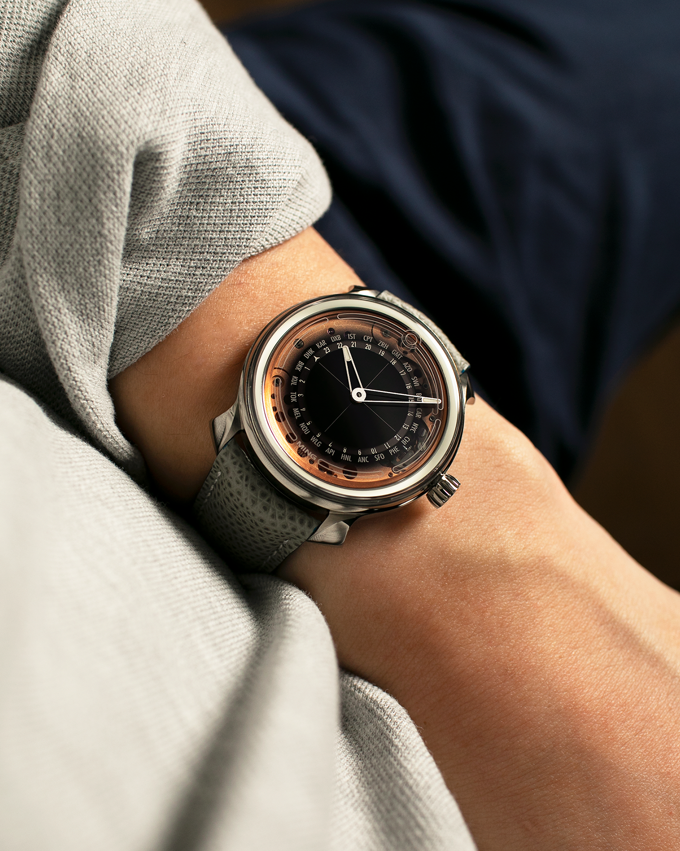 Brand: MING
Year: 2020
Model: 19.02 World Timer
Material: Grade 5 Titanium
Movement: Schwarz-Etienne for MING Cal. ASE 220.1, Manual-Winding
Case Dimensions: 39mm x 10.9mm (Lug-to-Lug 43.9mm)
Lug Width: 20mm
Strap: Jean Rousseau for MING Grey Calf Leather Strap with Signed Grade 5 Titanium Tang Buckle