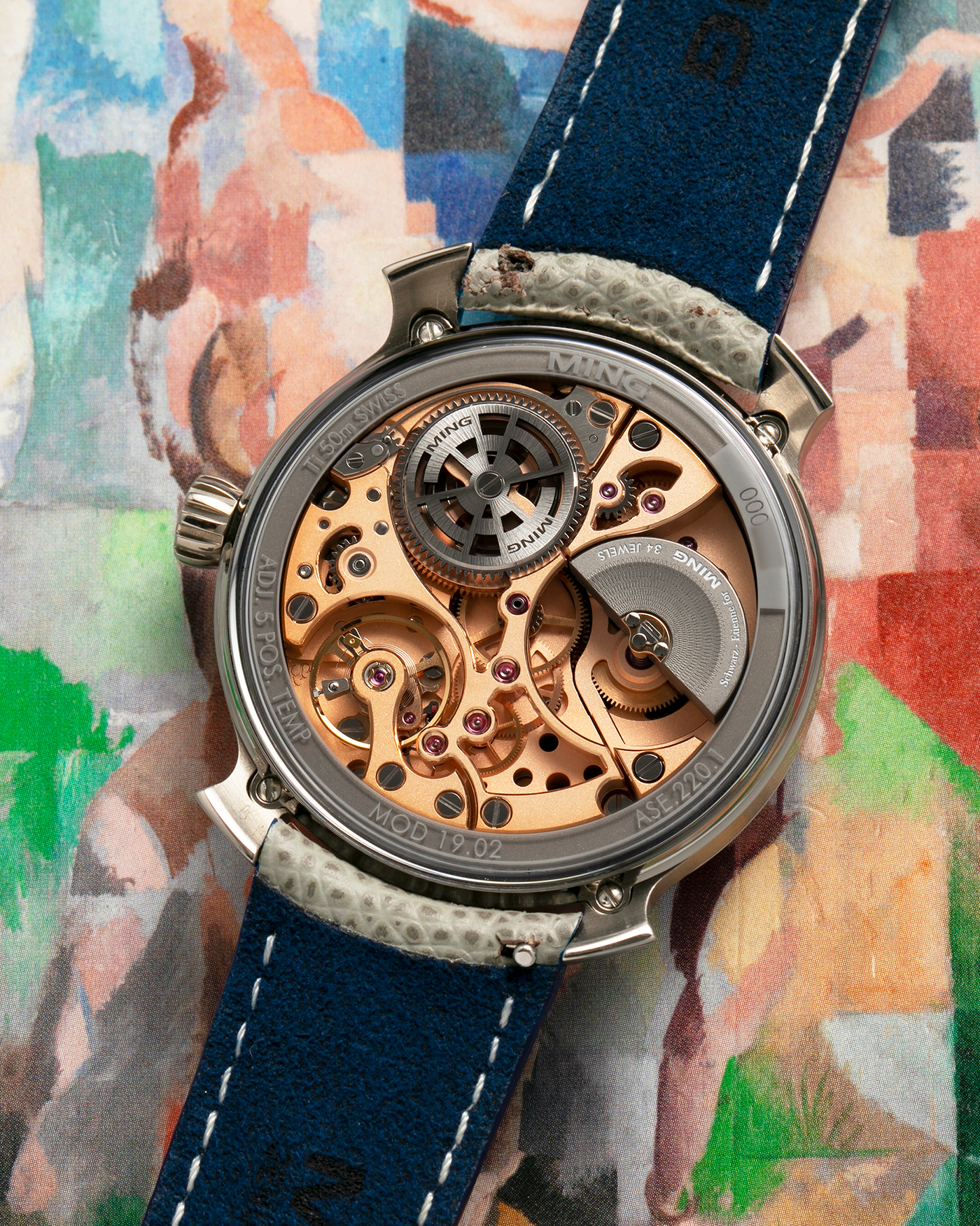 Brand: MING
Year: 2020
Model: 19.02 World Timer
Material: Grade 5 Titanium
Movement: Schwarz-Etienne for MING Cal. ASE 220.1, Manual-Winding
Case Dimensions: 39mm x 10.9mm (Lug-to-Lug 43.9mm)
Lug Width: 20mm
Strap: Jean Rousseau for MING Grey Calf Leather Strap with Signed Grade 5 Titanium Tang Buckle