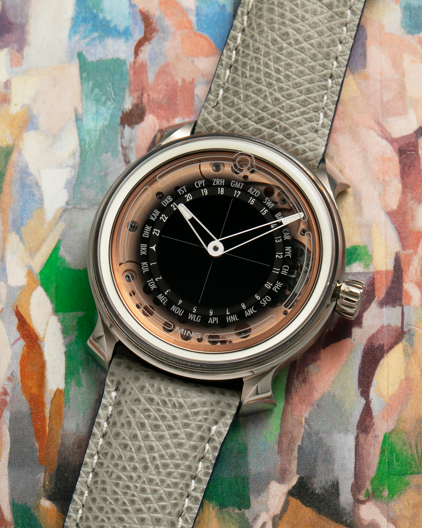 Brand: MING
Year: 2020
Model: 19.02 World Timer
Material: Grade 5 Titanium
Movement: Schwarz-Etienne for MING Cal. ASE 220.1, Manual-Winding
Case Dimensions: 39mm x 10.9mm (Lug-to-Lug 43.9mm)
Lug Width: 20mm
Strap: Jean Rousseau for MING Grey Calf Leather Strap with Signed Grade 5 Titanium Tang Buckle