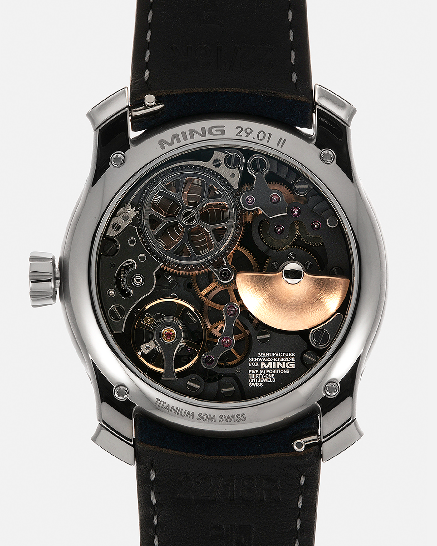 Brand: MING
Year: 2024 (Deliveries Began in March 2024)
Model: 29.01 World Timer, Limited Edition of 100 Pieces
Material: Grade 5 Titanium
Movement: Schwarz-Etienne for MING Cal. ASE 222, Manual-Winding Micro-Rotor
Case Dimensions: 40mm x 11.9mm (Lug-to-Lug 44.5mm)
Lug Width: 22mm
Strap: Jean Rousseau for MING Dark Navy Suede Leather Strap with Signed Titanium Keeperless Tang Buckle