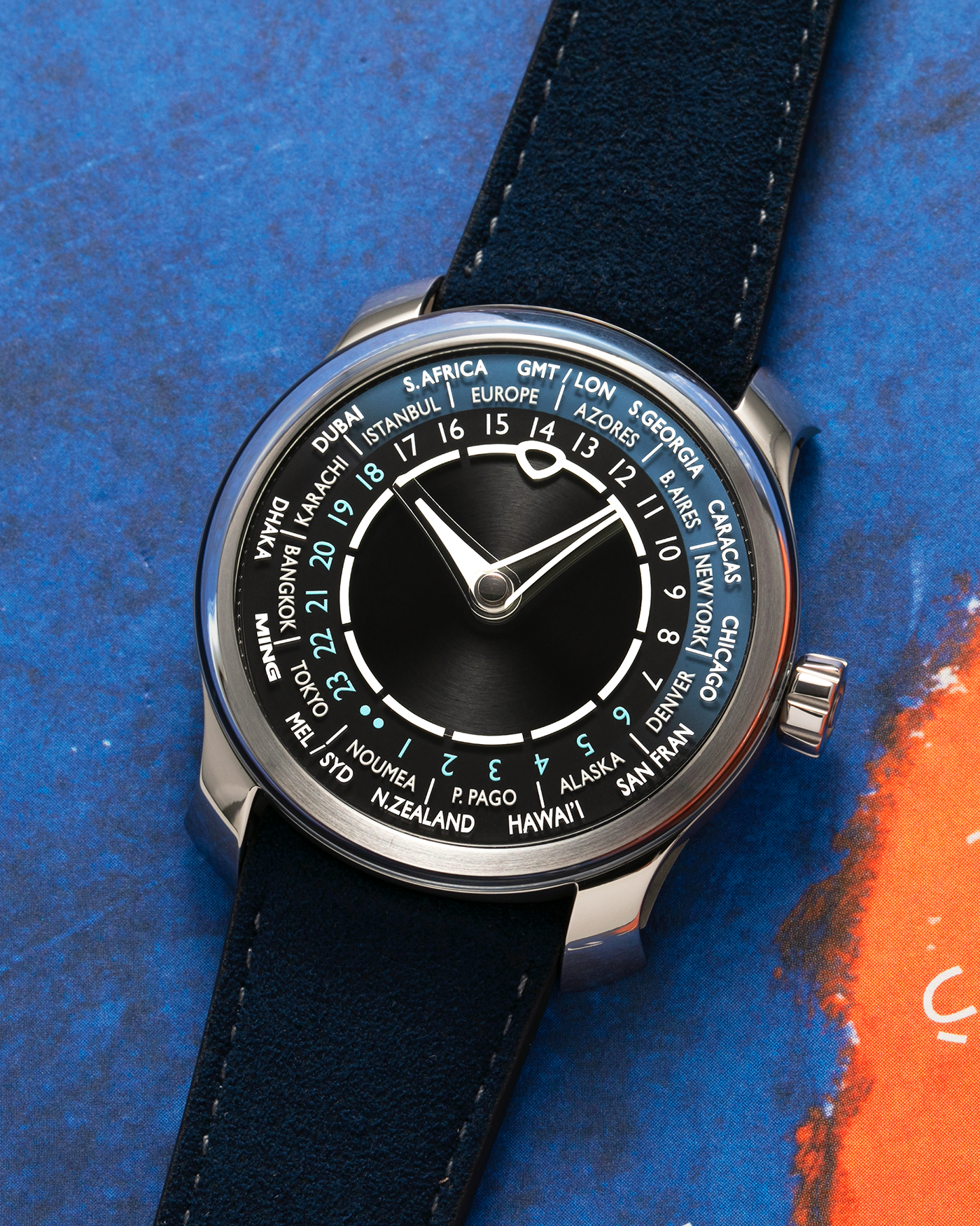 Brand: MING
Year: 2024 (Deliveries Began in March 2024)
Model: 29.01 World Timer, Limited Edition of 100 Pieces
Material: Grade 5 Titanium
Movement: Schwarz-Etienne for MING Cal. ASE 222, Manual-Winding Micro-Rotor
Case Dimensions: 40mm x 11.9mm (Lug-to-Lug 44.5mm)
Lug Width: 22mm
Strap: Jean Rousseau for MING Dark Navy Suede Leather Strap with Signed Titanium Keeperless Tang Buckle