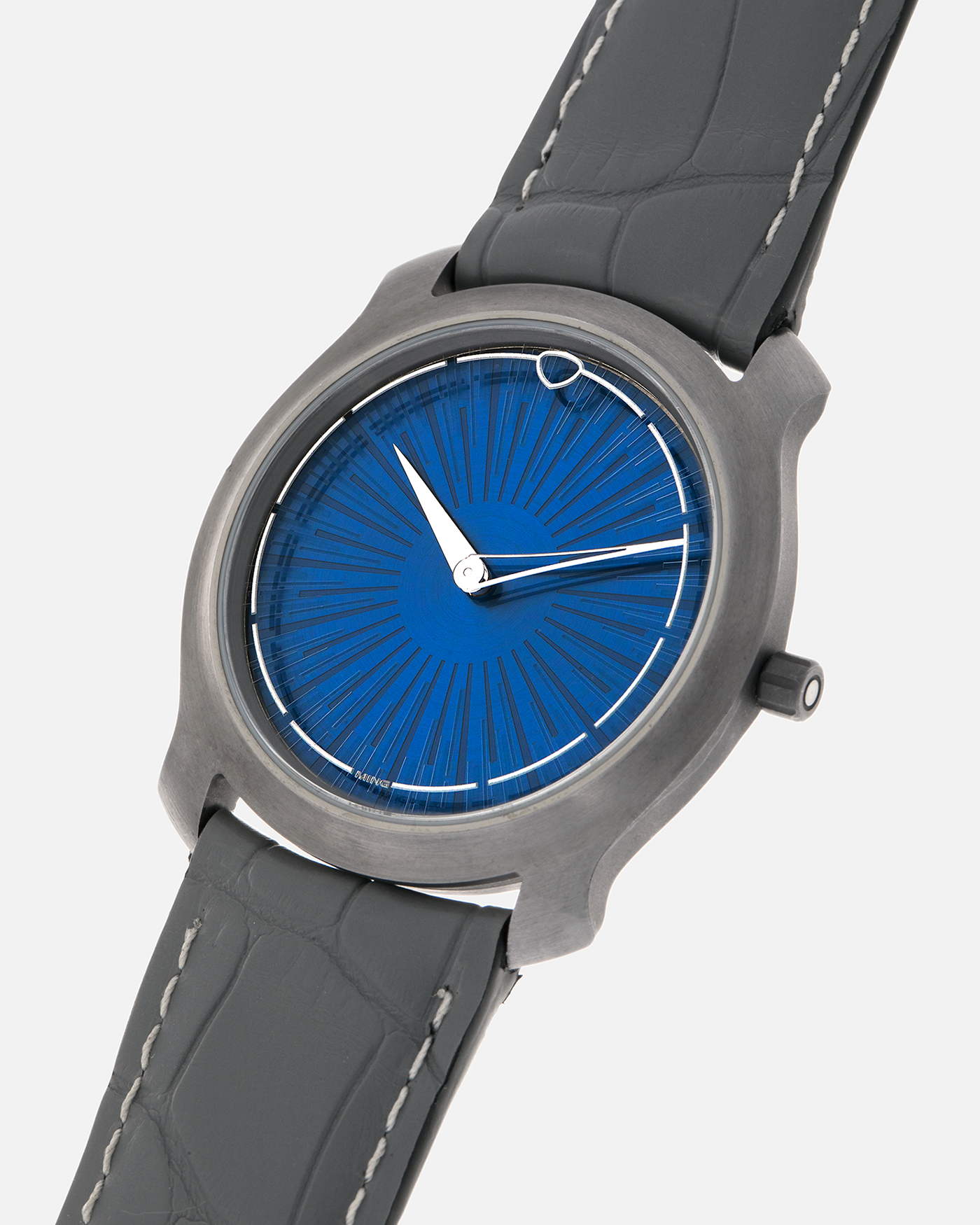 Brand: MING
Year: 2025
Model: Project 21 Souscription, Limited to 10 Pieces
Material: Tantalum Monobloc Case, FEMTOprint Borosilicate Crystal Dial, CVD-Coated Brass Dial Base
Movement: Heavily Modified Frederic Piguet Cal. 21, Manual-Winding
Case Dimensions: 35mm x 6.9mm (Lug-to-Lug 38.5mm)
Lug Width: 20mm
Strap: MING Dark Blue Alcantara Strap with Signed Tantalum Pin Buckle