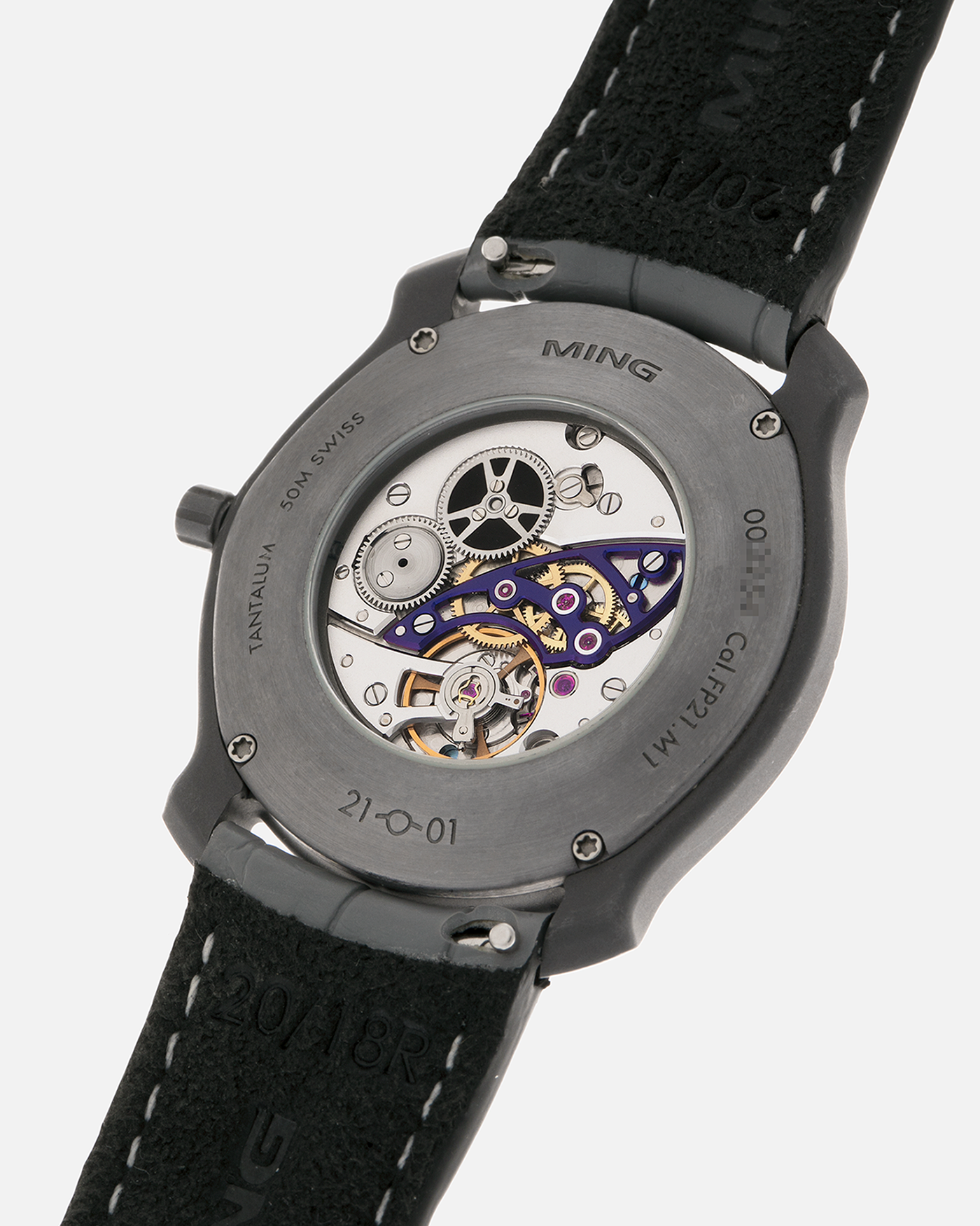 Brand: MING
Year: 2025
Model: Project 21 Souscription, Limited to 10 Pieces
Material: Tantalum Monobloc Case, FEMTOprint Borosilicate Crystal Dial, CVD-Coated Brass Dial Base
Movement: Heavily Modified Frederic Piguet Cal. 21, Manual-Winding
Case Dimensions: 35mm x 6.9mm (Lug-to-Lug 38.5mm)
Lug Width: 20mm
Strap: MING Dark Blue Alcantara Strap with Signed Tantalum Pin Buckle