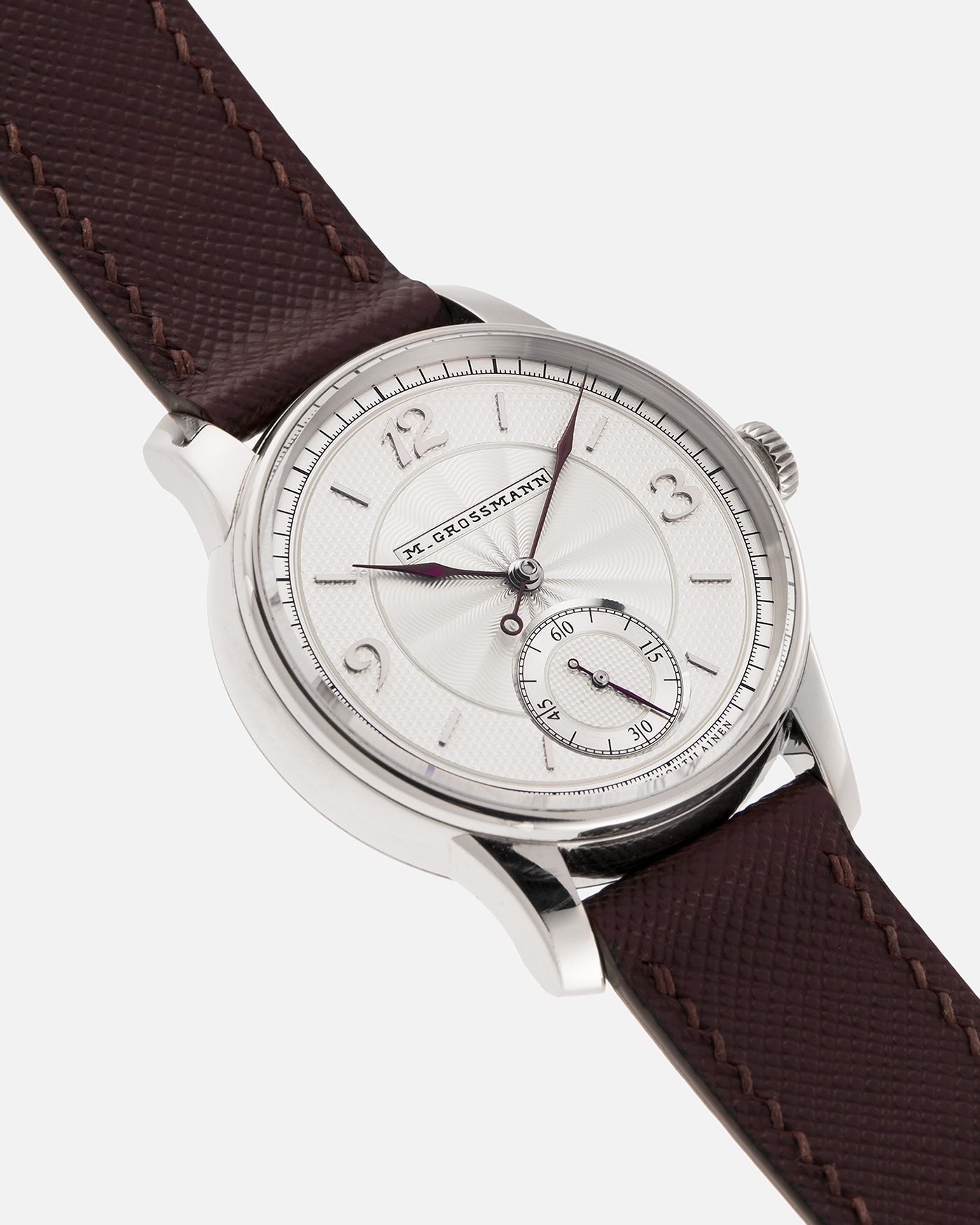 Brand: Moritz Grossmann
Year: 2023
Model: Benu 37 Grail Watch ‘Silver Bullet’
Reference Number: MG-003588
Material: 18k White Gold
Movement: Manual-Winding Cal. 102.1
Case Dimensions: 37mm Diameter 9.4mm Thickness
Strap: Moritz Grossman Anemone Kudu Leather Strap, Delugs White Himalayan Alligator Strap, Strapology Purple Textured Calf Strap and 18k White Gold Moritz Grossmann Tang Buckle