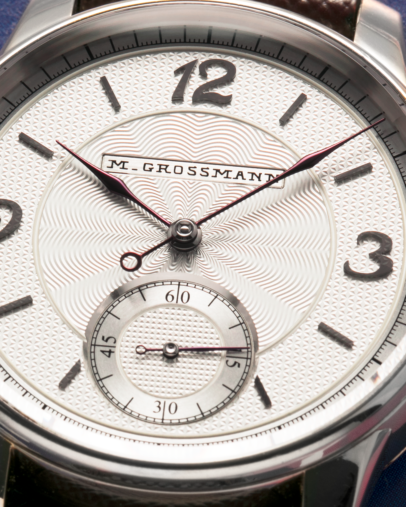 Brand: Moritz Grossmann
Year: 2023
Model: Benu 37 Grail Watch ‘Silver Bullet’
Reference Number: MG-003588
Material: 18k White Gold
Movement: Manual-Winding Cal. 102.1
Case Dimensions: 37mm Diameter 9.4mm Thickness
Strap: Moritz Grossman Anemone Kudu Leather Strap, Delugs White Himalayan Alligator Strap, Strapology Purple Textured Calf Strap and 18k White Gold Moritz Grossmann Tang Buckle