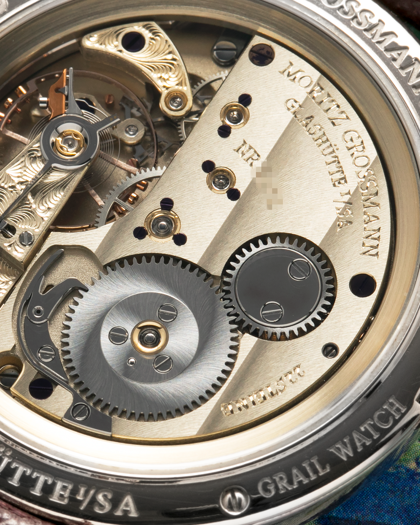 Brand: Moritz Grossmann
Year: 2023
Model: Benu 37 Grail Watch ‘Silver Bullet’
Reference Number: MG-003588
Material: 18k White Gold
Movement: Manual-Winding Cal. 102.1
Case Dimensions: 37mm Diameter 9.4mm Thickness
Strap: Moritz Grossman Anemone Kudu Leather Strap, Delugs White Himalayan Alligator Strap, Strapology Purple Textured Calf Strap and 18k White Gold Moritz Grossmann Tang Buckle