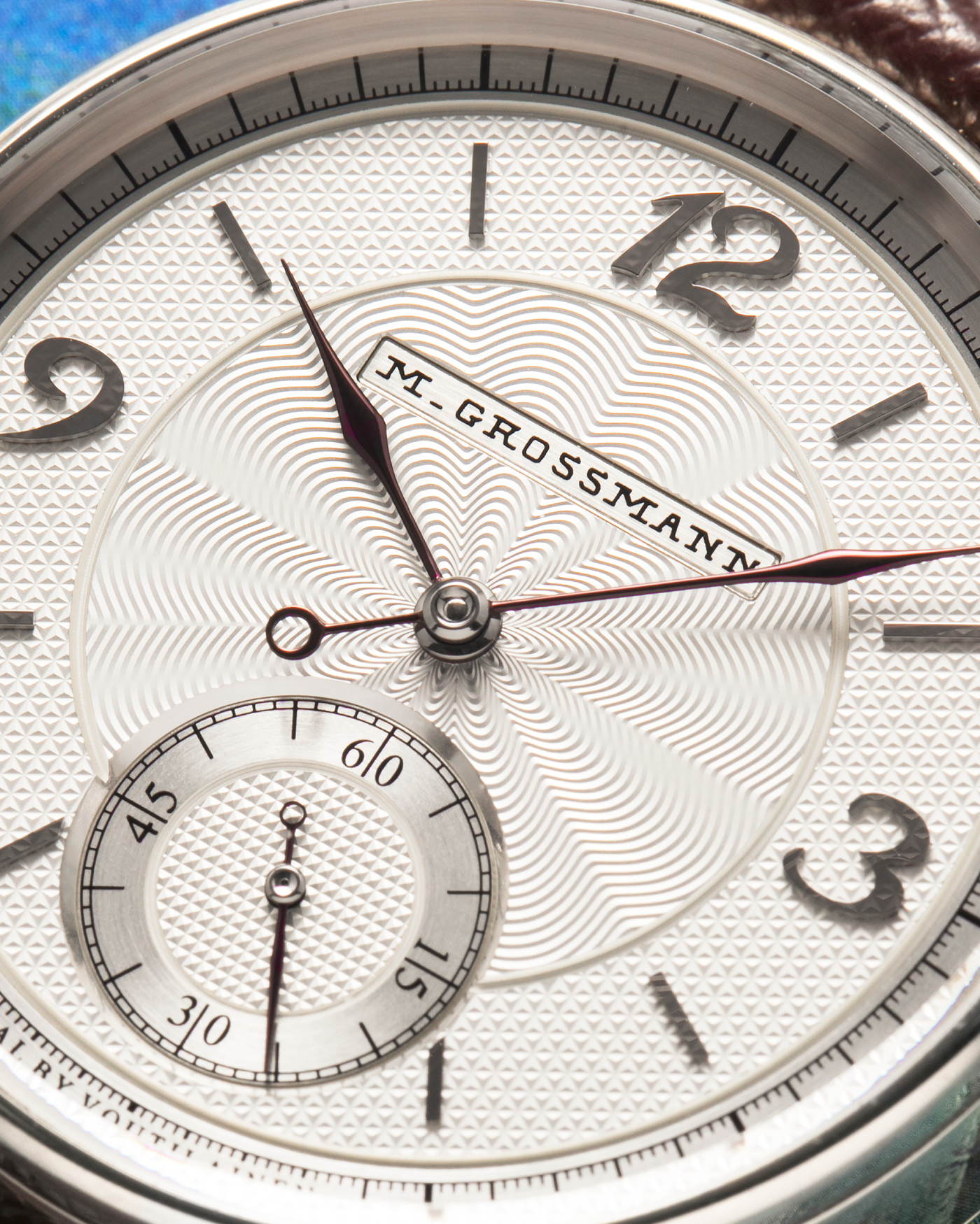 Brand: Moritz Grossmann
Year: 2023
Model: Benu 37 Grail Watch ‘Silver Bullet’
Reference Number: MG-003588
Material: 18k White Gold
Movement: Manual-Winding Cal. 102.1
Case Dimensions: 37mm Diameter 9.4mm Thickness
Strap: Moritz Grossman Anemone Kudu Leather Strap, Delugs White Himalayan Alligator Strap, Strapology Purple Textured Calf Strap and 18k White Gold Moritz Grossmann Tang Buckle