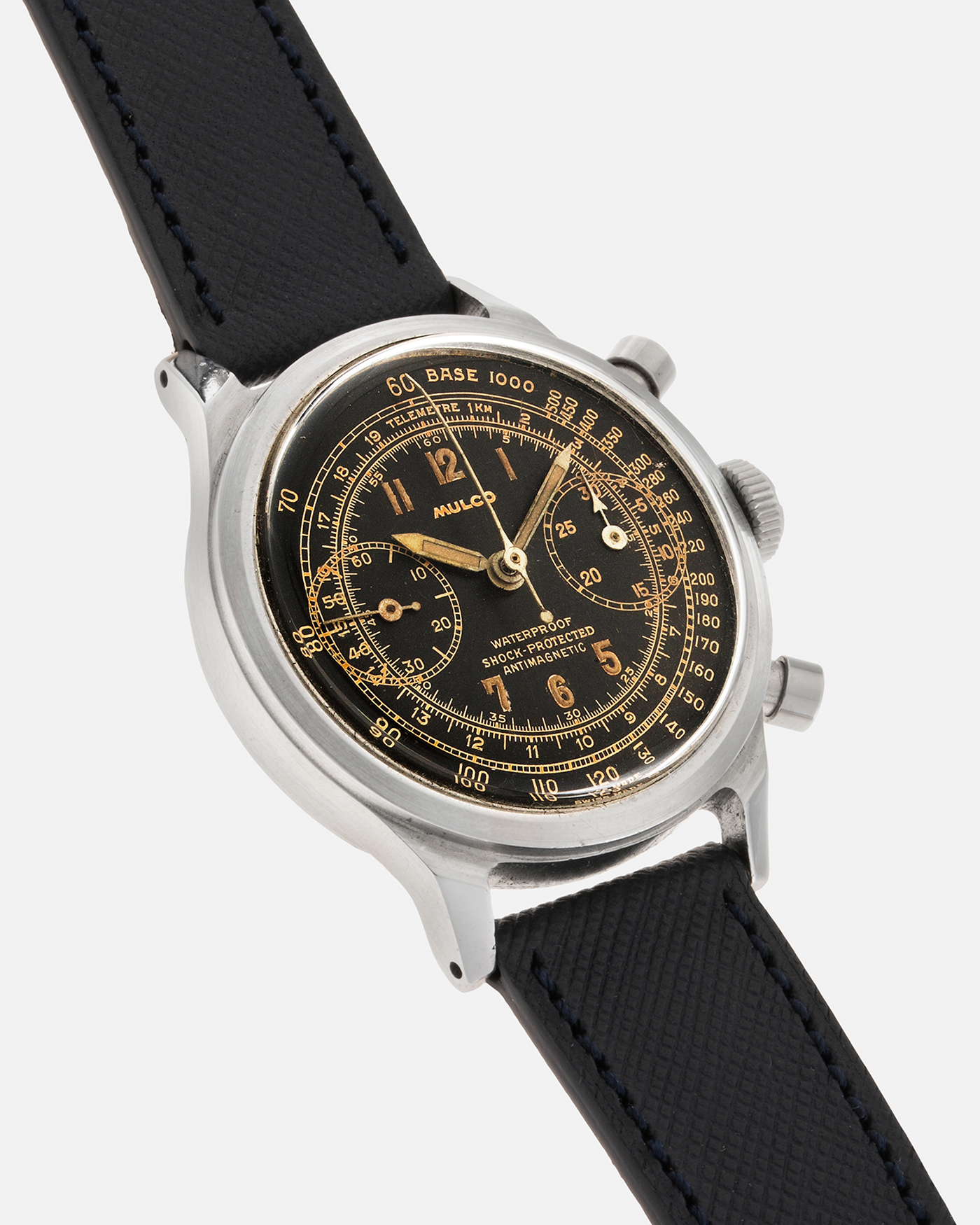 Brand: Mulco Year: 1940s Material: Stainless Steel Movement: Valjoux Cal. 22, Manual-Winding Case Diameter: 38mm (Spillman Case) Lug Width: 19mm Strap: Molequin Navy Textured Calf Leather Strap