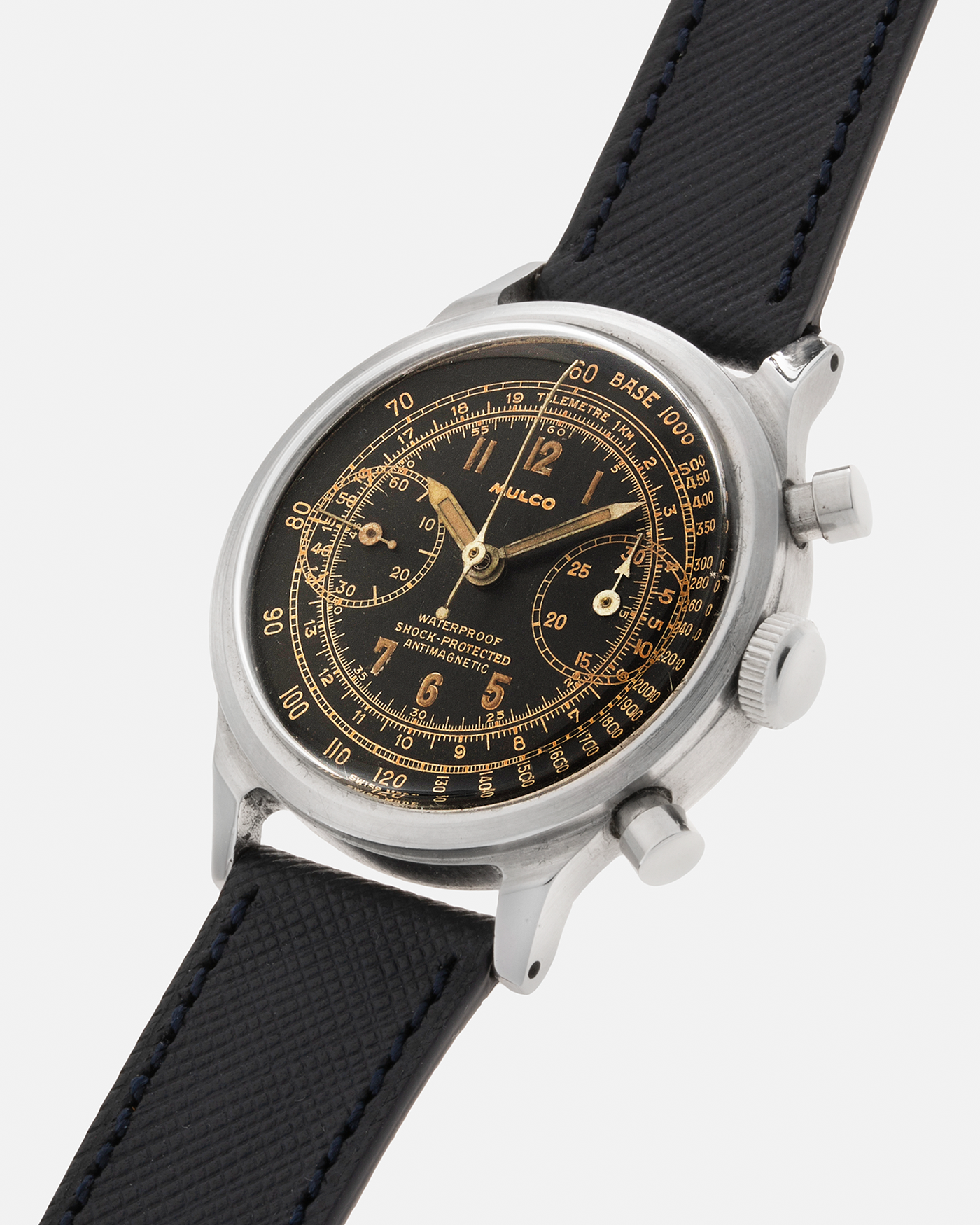 Brand: Mulco Year: 1940s Material: Stainless Steel Movement: Valjoux Cal. 22, Manual-Winding Case Diameter: 38mm (Spillman Case) Lug Width: 19mm Strap: Molequin Navy Textured Calf Leather Strap