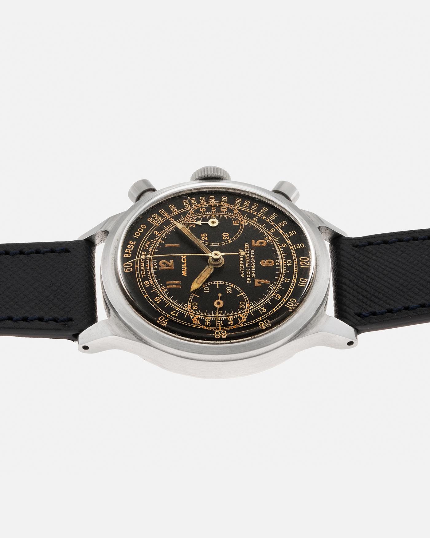 Brand: Mulco Year: 1940s Material: Stainless Steel Movement: Valjoux Cal. 22, Manual-Winding Case Diameter: 38mm (Spillman Case) Lug Width: 19mm Strap: Molequin Navy Textured Calf Leather Strap