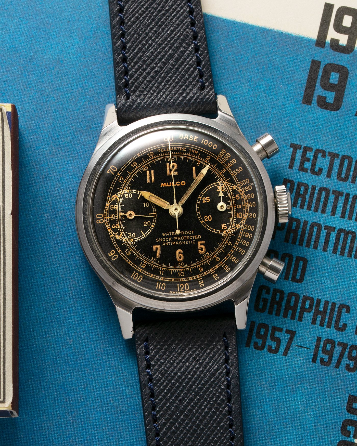 Brand: Mulco Year: 1940s Material: Stainless Steel Movement: Valjoux Cal. 22, Manual-Winding Case Diameter: 38mm (Spillman Case) Lug Width: 19mm Strap: Molequin Navy Textured Calf Leather Strap