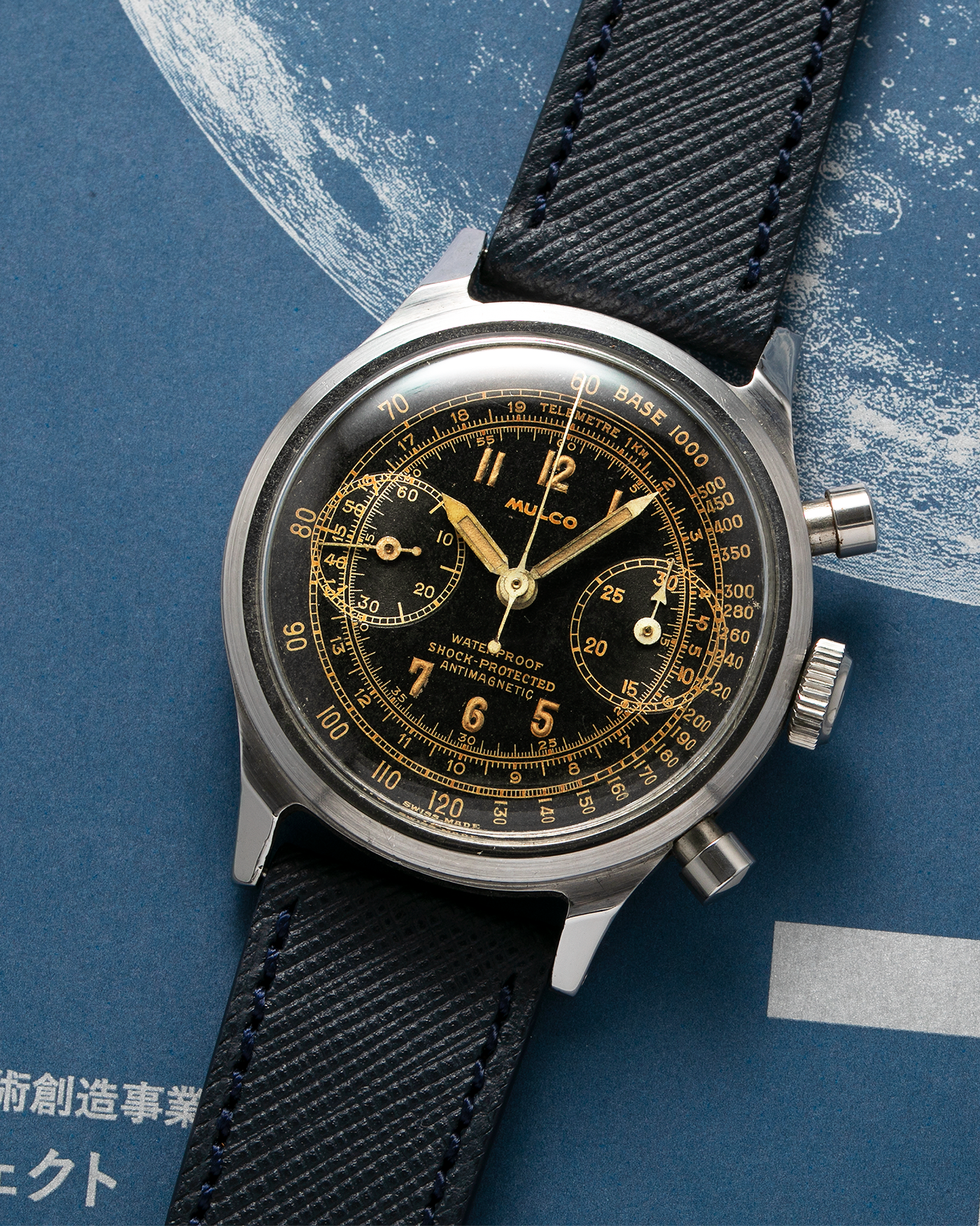 Brand: Mulco Year: 1940s Material: Stainless Steel Movement: Valjoux Cal. 22, Manual-Winding Case Diameter: 38mm (Spillman Case) Lug Width: 19mm Strap: Molequin Navy Textured Calf Leather Strap