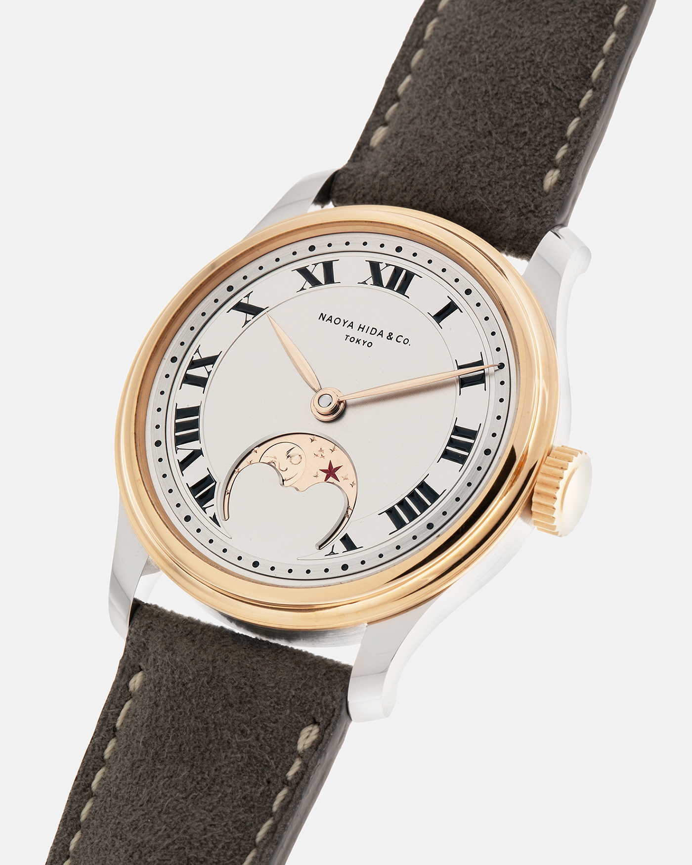 Brand: Naoya Hida
Year: 2025
Model: NH Type 3B-2, Revolution Magazine Limited Edition of 10 Pieces
Material: 904L Stainless Steel Case, German Silver Dial with Dark Grey DLC Treatment 
Movement: NH Cal. 3021LU (Based on Valjoux Cal. 7750), Manual-Winding
Case Dimensions: 37mm x 10.7mm (44mm Lug-to-Lug)
Lug Width: 20mm
Strap: Jean Rousseau Grey Suede Strap with Signed 904L Stainless Steel Tang Buckle