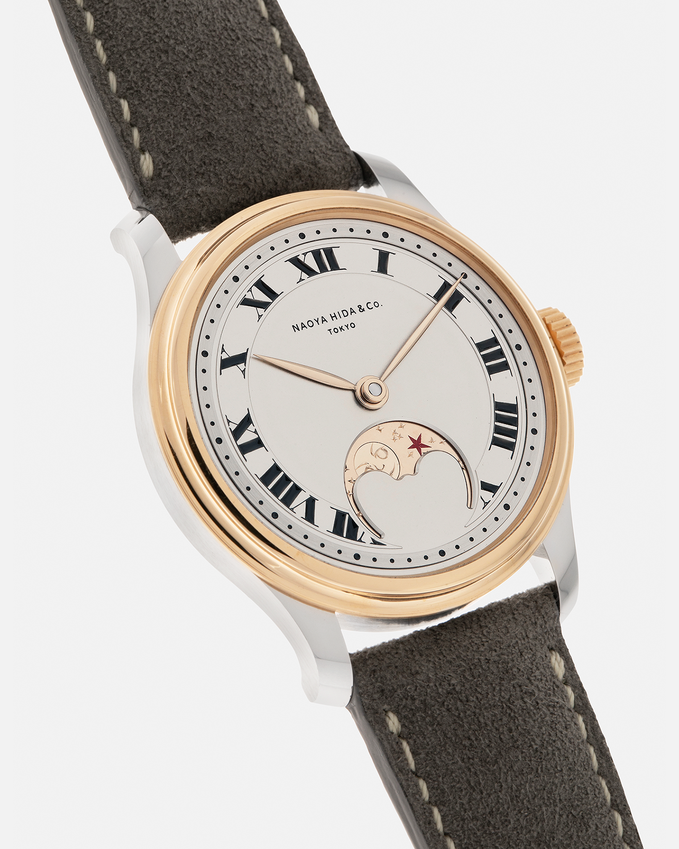 Brand: Naoya Hida
Year: 2025
Model: NH Type 3B-2, Revolution Magazine Limited Edition of 10 Pieces
Material: 904L Stainless Steel Case, German Silver Dial with Dark Grey DLC Treatment 
Movement: NH Cal. 3021LU (Based on Valjoux Cal. 7750), Manual-Winding
Case Dimensions: 37mm x 10.7mm (44mm Lug-to-Lug)
Lug Width: 20mm
Strap: Jean Rousseau Grey Suede Strap with Signed 904L Stainless Steel Tang Buckle
