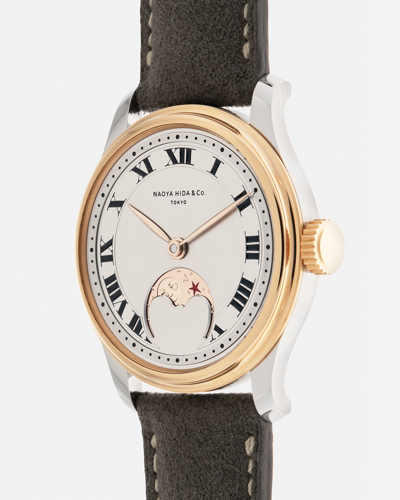 Brand: Naoya Hida
Year: 2025
Model: NH Type 3B-2, Revolution Magazine Limited Edition of 10 Pieces
Material: 904L Stainless Steel Case, German Silver Dial with Dark Grey DLC Treatment 
Movement: NH Cal. 3021LU (Based on Valjoux Cal. 7750), Manual-Winding
Case Dimensions: 37mm x 10.7mm (44mm Lug-to-Lug)
Lug Width: 20mm
Strap: Jean Rousseau Grey Suede Strap with Signed 904L Stainless Steel Tang Buckle