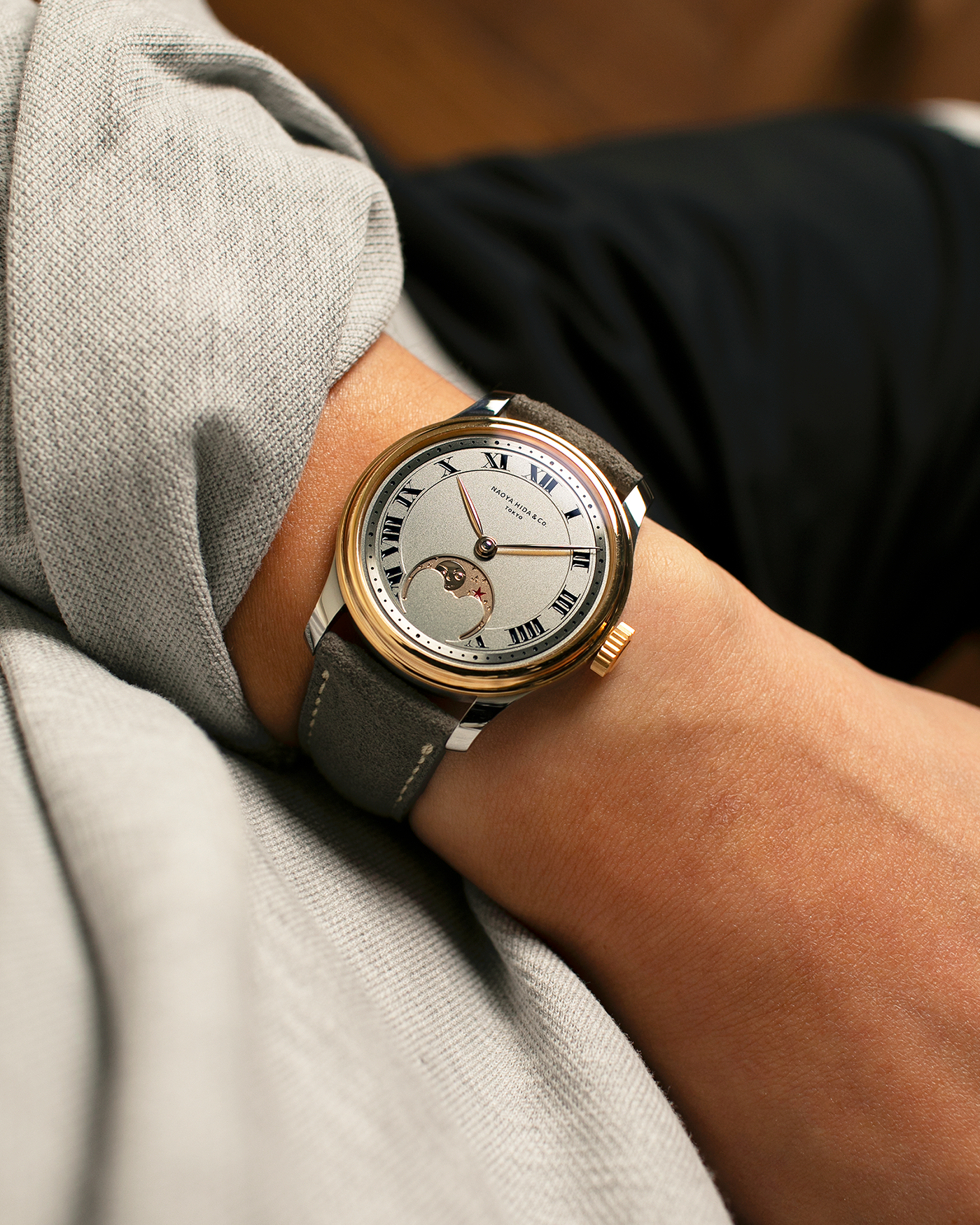 Brand: Naoya Hida
Year: 2025
Model: NH Type 3B-2, Revolution Magazine Limited Edition of 10 Pieces
Material: 904L Stainless Steel Case, German Silver Dial with Dark Grey DLC Treatment 
Movement: NH Cal. 3021LU (Based on Valjoux Cal. 7750), Manual-Winding
Case Dimensions: 37mm x 10.7mm (44mm Lug-to-Lug)
Lug Width: 20mm
Strap: Jean Rousseau Grey Suede Strap with Signed 904L Stainless Steel Tang Buckle