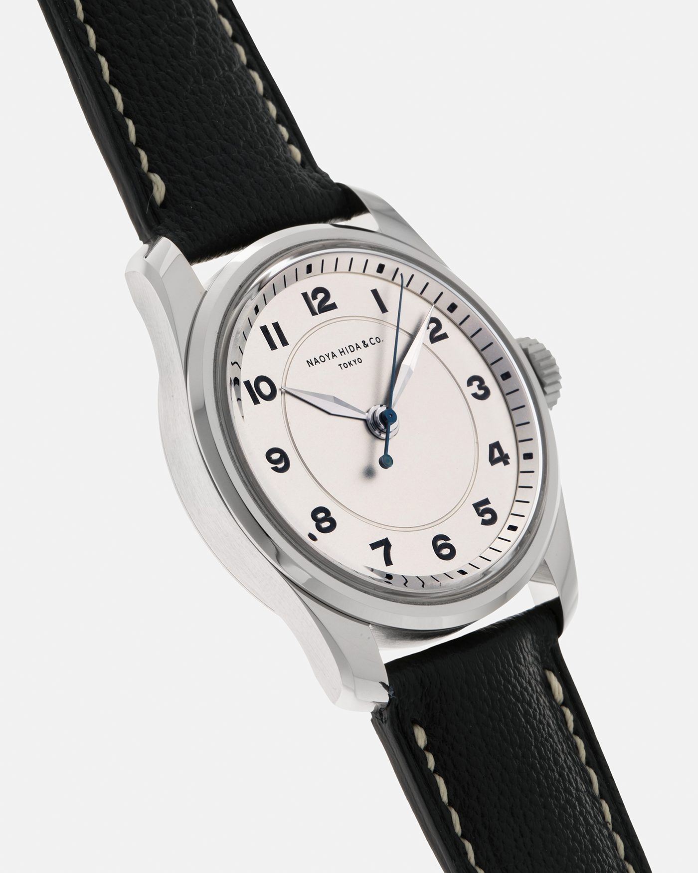 Brand: Naoya Hida
Year: 2024
Model: NH Type 4A
Material: 904L Stainless Steel Case, German Silver Dial
Movement: NH Cal. 3020SS (Based on Valjoux Cal. 7750), Manual-Winding
Case Dimensions: 36mm x 11mm (42mm Lug-to-Lug)
Lug Width: 20mm
Strap: Jean Rousseau Dark Brown Leather Strap with Signed 904L Stainless Steel Tang Buckle