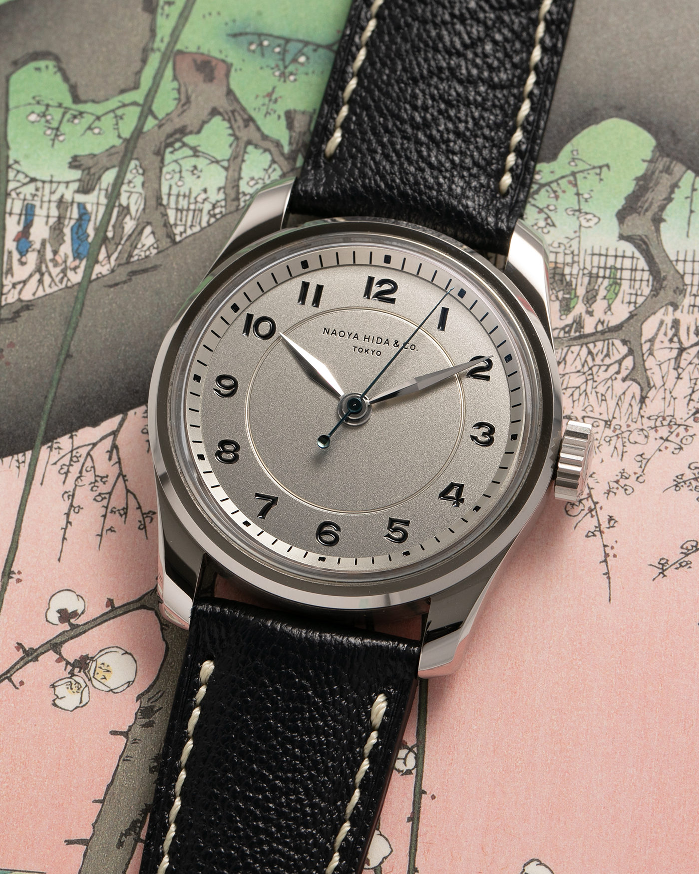 Brand: Naoya Hida
Year: 2024
Model: NH Type 4A
Material: 904L Stainless Steel Case, German Silver Dial
Movement: NH Cal. 3020SS (Based on Valjoux Cal. 7750), Manual-Winding
Case Dimensions: 36mm x 11mm (42mm Lug-to-Lug)
Lug Width: 20mm
Strap: Jean Rousseau Dark Brown Leather Strap with Signed 904L Stainless Steel Tang Buckle