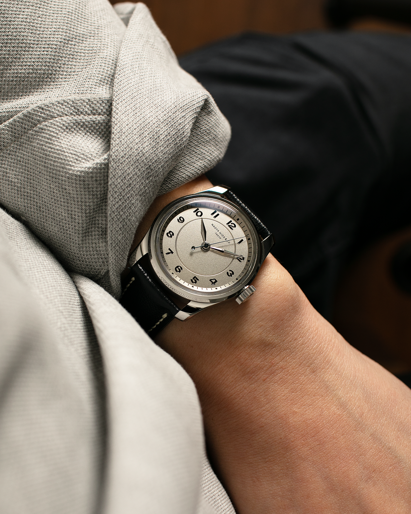 Brand: Naoya Hida
Year: 2024
Model: NH Type 4A
Material: 904L Stainless Steel Case, German Silver Dial
Movement: NH Cal. 3020SS (Based on Valjoux Cal. 7750), Manual-Winding
Case Dimensions: 36mm x 11mm (42mm Lug-to-Lug)
Lug Width: 20mm
Strap: Jean Rousseau Dark Brown Leather Strap with Signed 904L Stainless Steel Tang Buckle