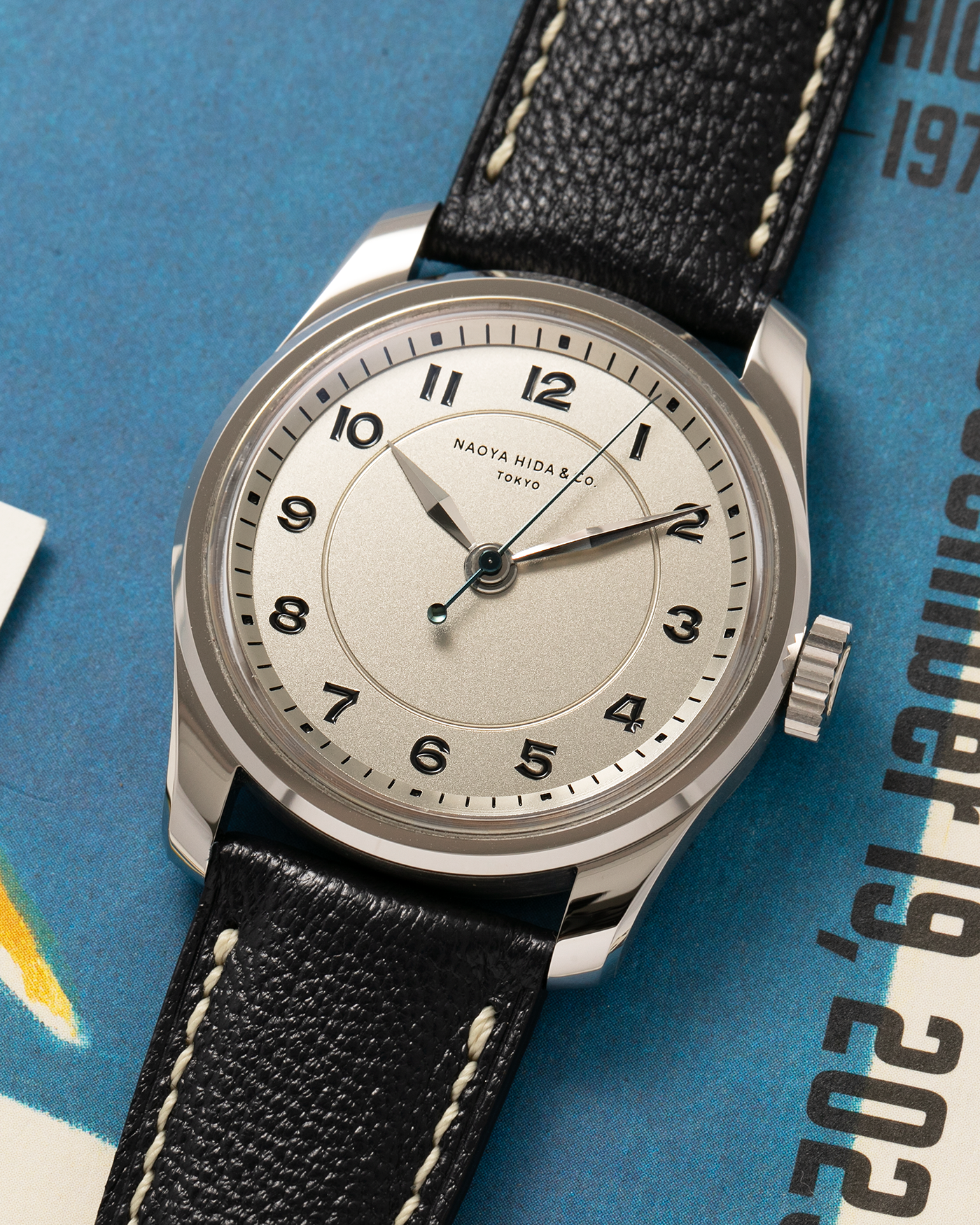 Brand: Naoya Hida
Year: 2024
Model: NH Type 4A
Material: 904L Stainless Steel Case, German Silver Dial
Movement: NH Cal. 3020SS (Based on Valjoux Cal. 7750), Manual-Winding
Case Dimensions: 36mm x 11mm (42mm Lug-to-Lug)
Lug Width: 20mm
Strap: Jean Rousseau Dark Brown Leather Strap with Signed 904L Stainless Steel Tang Buckle