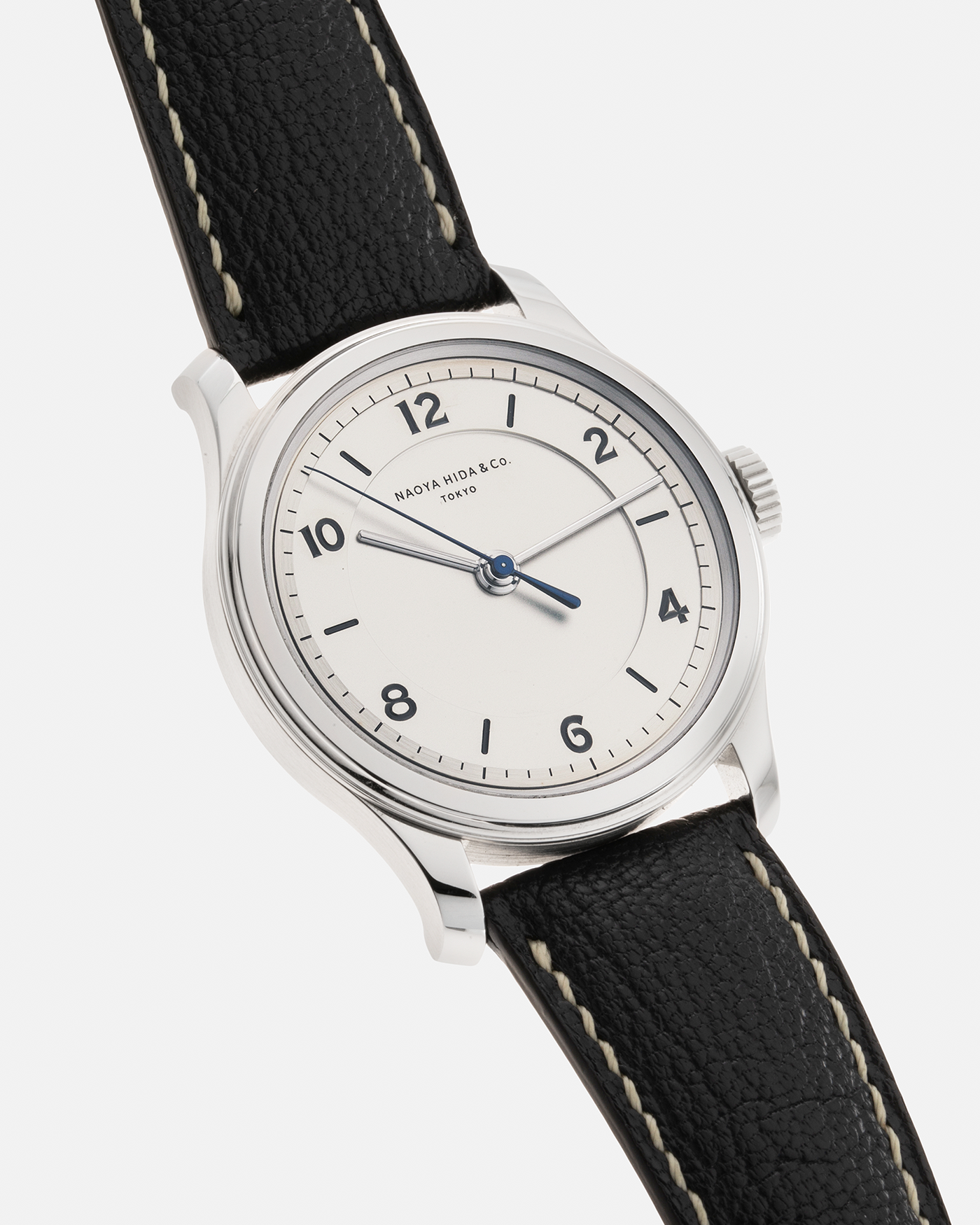 Brand: Naoya Hida Year: 2022 Model: NH Type 2B Material: 904L Stainless Steel Case, German Silver Dial  Movement: Cal. 3020CS, Manual-Winding Case Diameter: 37mm Strap: Naoya Hida (Jean Rousseau) Navy Blue Leather Strap with Contrasting Stitching and Signed Stainless Steel Tang Buckle