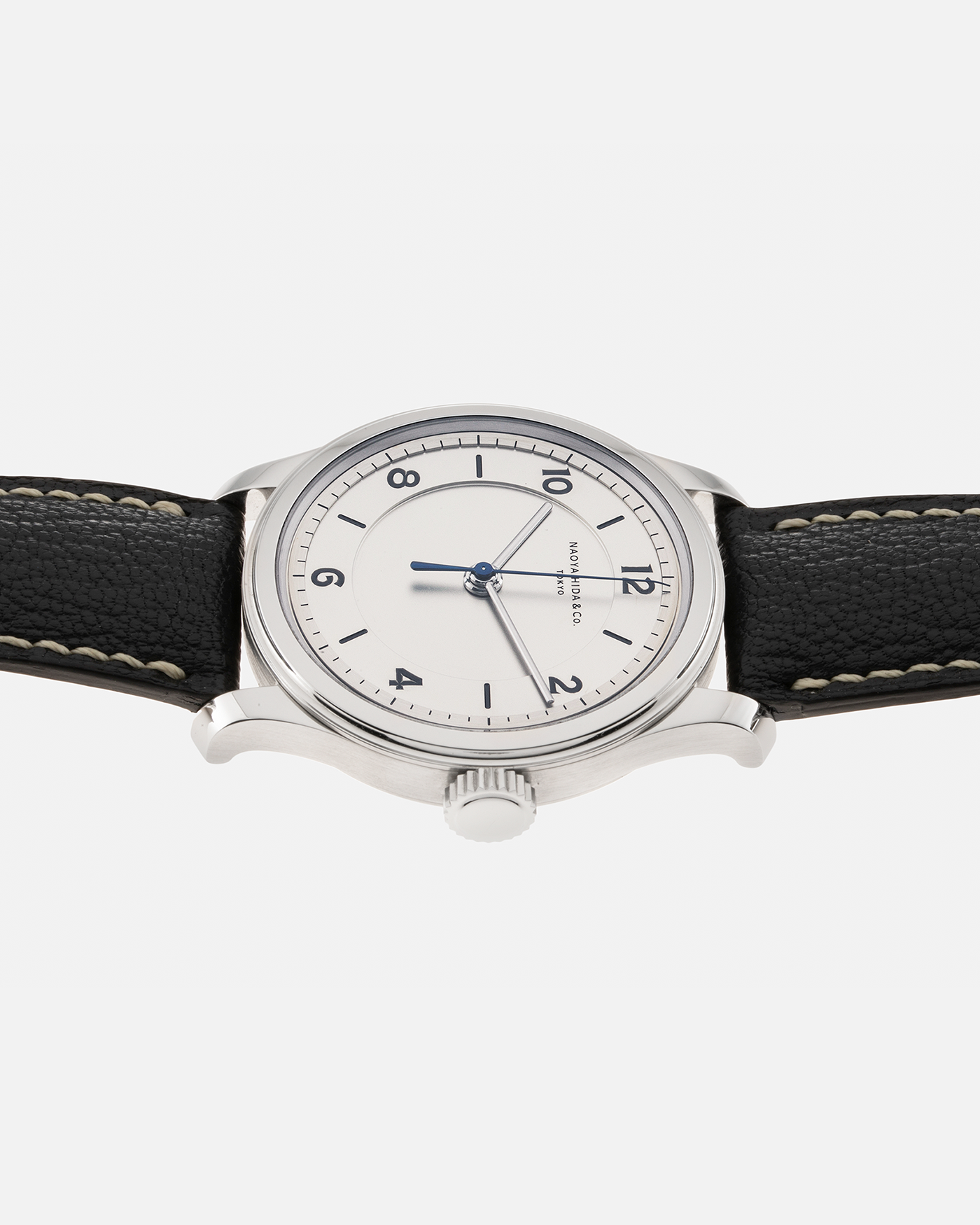 Brand: Naoya Hida Year: 2022 Model: NH Type 2B Material: 904L Stainless Steel Case, German Silver Dial  Movement: Cal. 3020CS, Manual-Winding Case Diameter: 37mm Strap: Naoya Hida (Jean Rousseau) Navy Blue Leather Strap with Contrasting Stitching and Signed Stainless Steel Tang Buckle