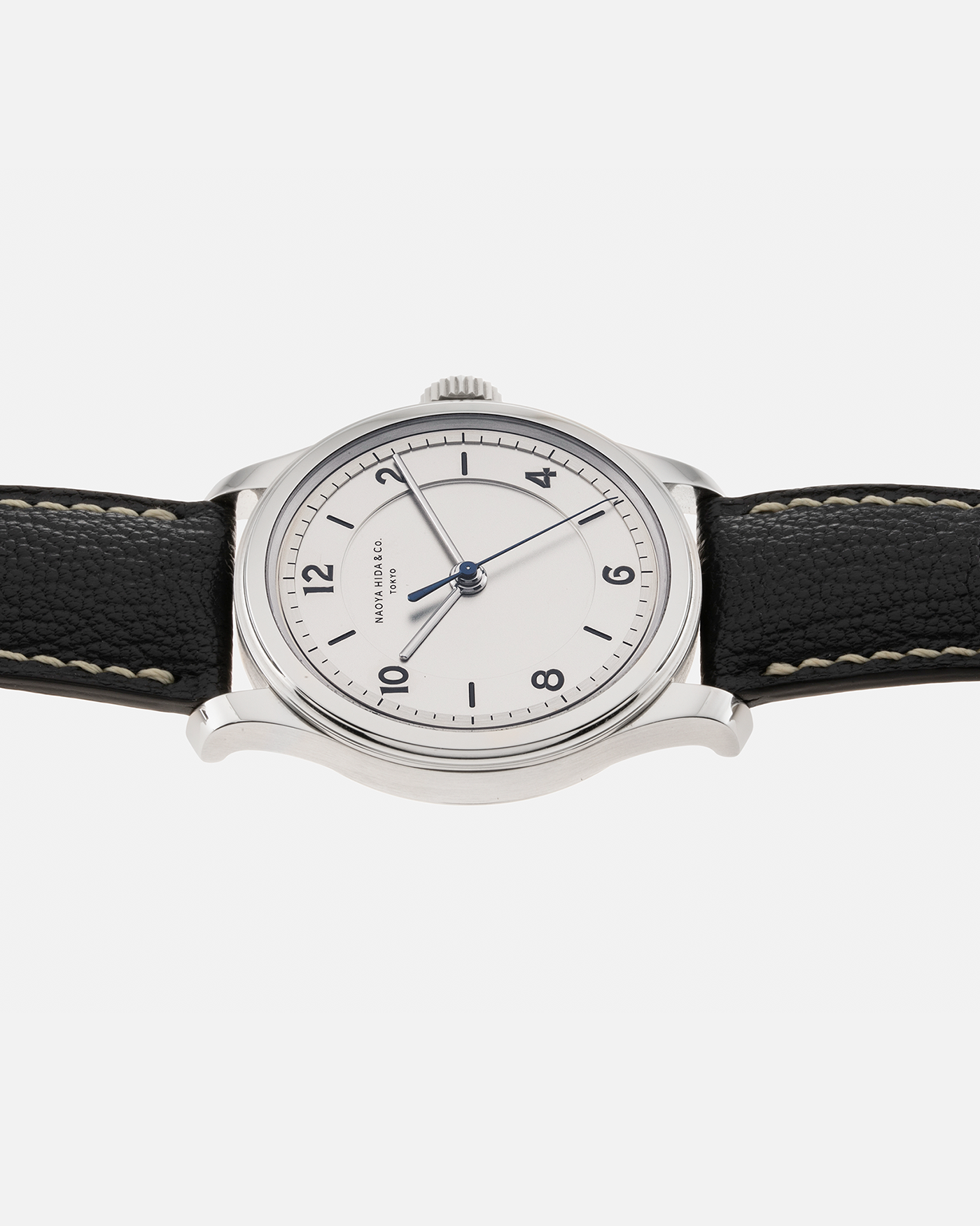Brand: Naoya Hida Year: 2022 Model: NH Type 2B Material: 904L Stainless Steel Case, German Silver Dial  Movement: Cal. 3020CS, Manual-Winding Case Diameter: 37mm Strap: Naoya Hida (Jean Rousseau) Navy Blue Leather Strap with Contrasting Stitching and Signed Stainless Steel Tang Buckle