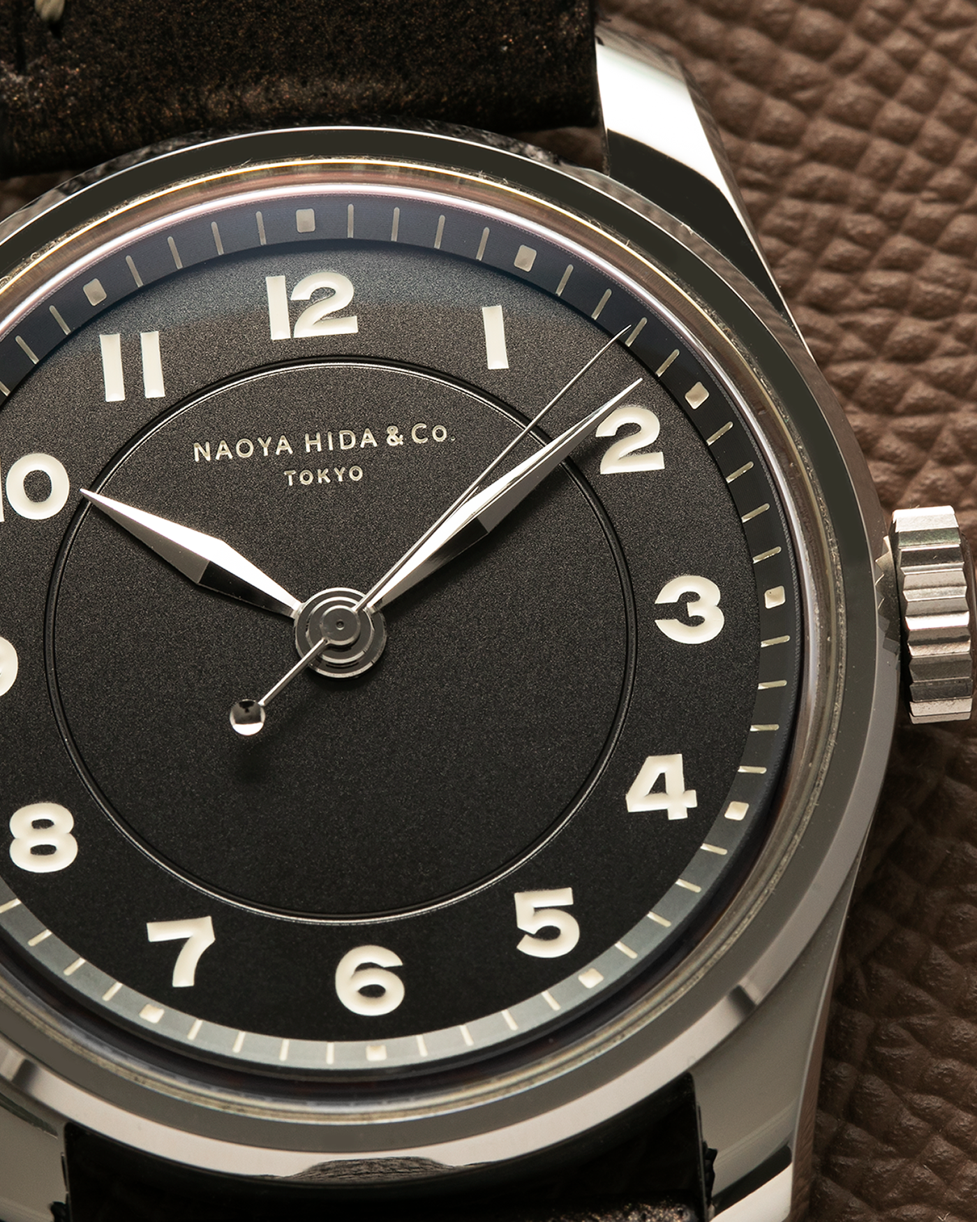 Brand: Naoya Hida
Year: 2024
Model: NH Type 4A-1
Material: 904L Stainless Steel Case, German Silver Dial with Dark Grey DLC Treatment 
Movement: NH Cal. 3020SS (Based on Valjoux Cal. 7750), Manual-Winding
Case Dimensions: 36mm x 11mm (42mm Lug-to-Lug)
Lug Width: 20mm
Strap: Jean Rousseau Dark Brown Goat Leather Strap with Signed 904L Stainless Steel Tang Buckle, additional Jean Rousseau Tanned Brown Goat Leather Strap