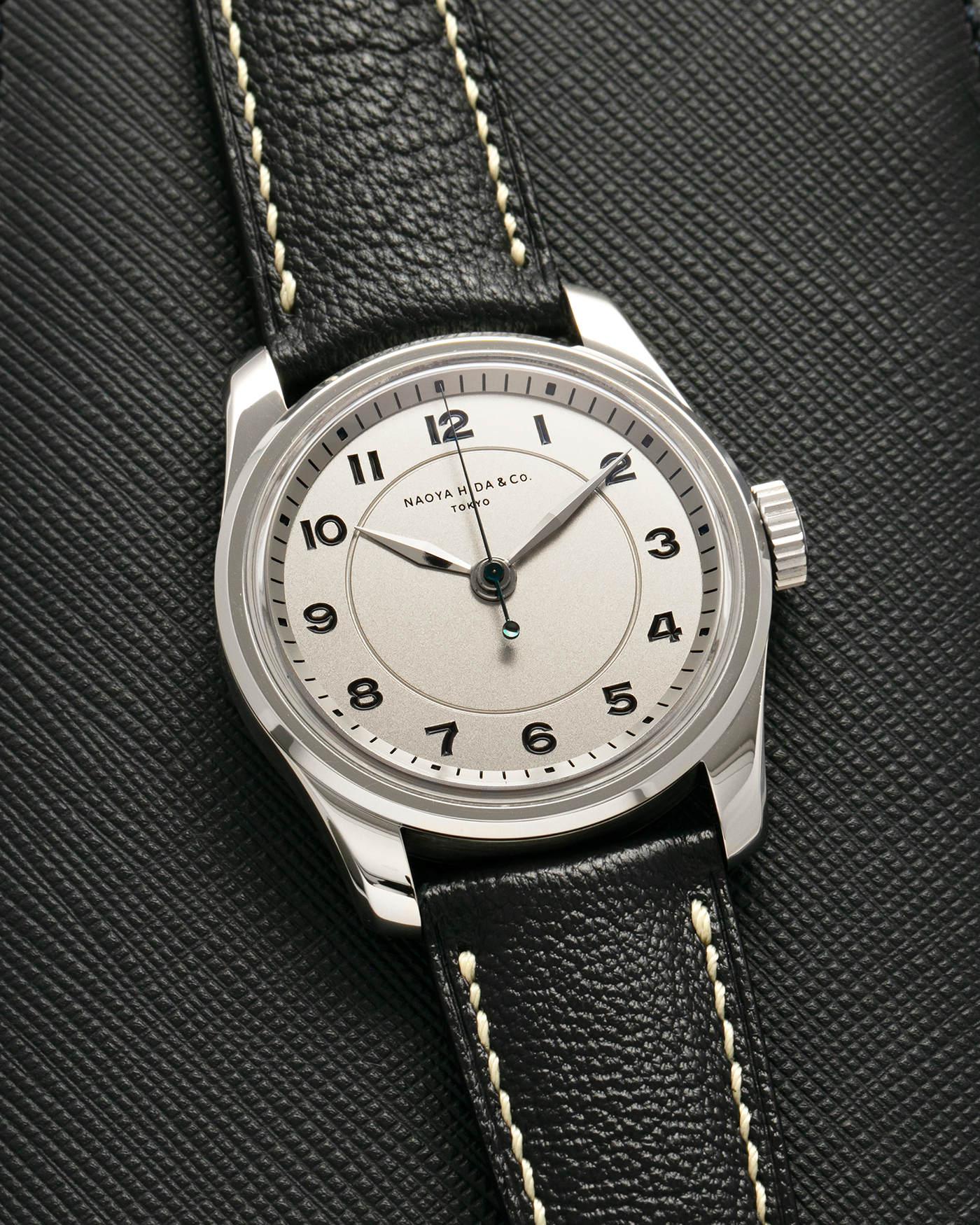 Brand: Naoya Hida
Year: 2024
Model: NH Type 4A
Material: 904L Stainless Steel Case, German Silver Dial
Movement: NH Calibre 3020SS (Based on Valjoux Cal. 7750), Manual-Winding
Case Dimensions: 36mm Diameter 11mm Thickness
Lug Width: 20mm
Strap: Jean Rousseau Dark Blue Leather Strap with Signed 904L Stainless Steel Tang Buckle