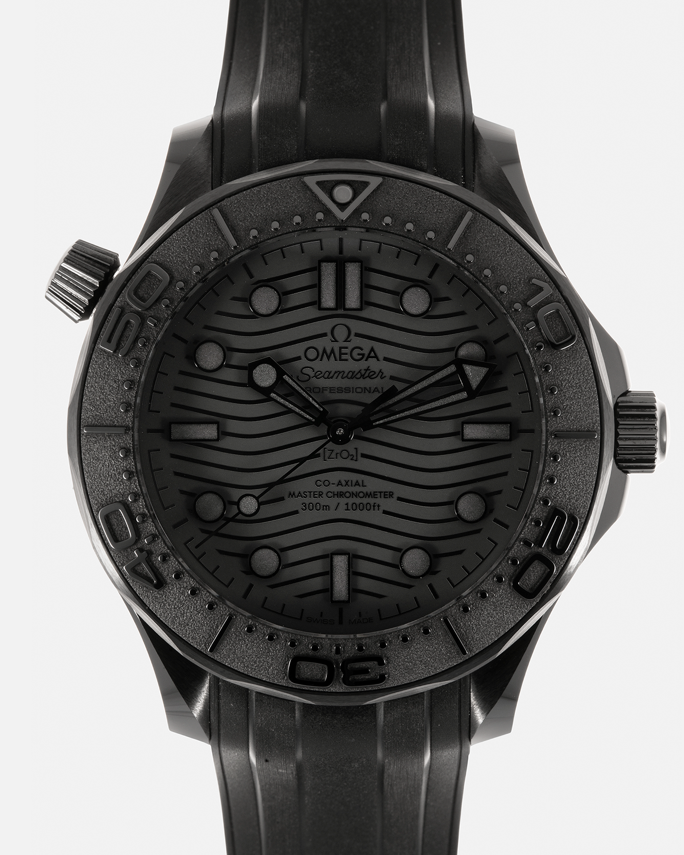 Brand: Omega
Year: 2022
Model: Seamaster 300m ‘Black Black’
Reference Number: 210.92.44.20.01.003
Material: Black Ceramic (ZrO2)
Movement: Omega Co-Axial Cal. 8806 (METAS-Certified), Self-Winding
Case Dimensions: 43.5mm x 14.47mm (51.5mm Lug-to-Lug)
Lug Width: 21mm
Strap: Omega Black Rubber Strap with Signed Ceramic Tang Buckle