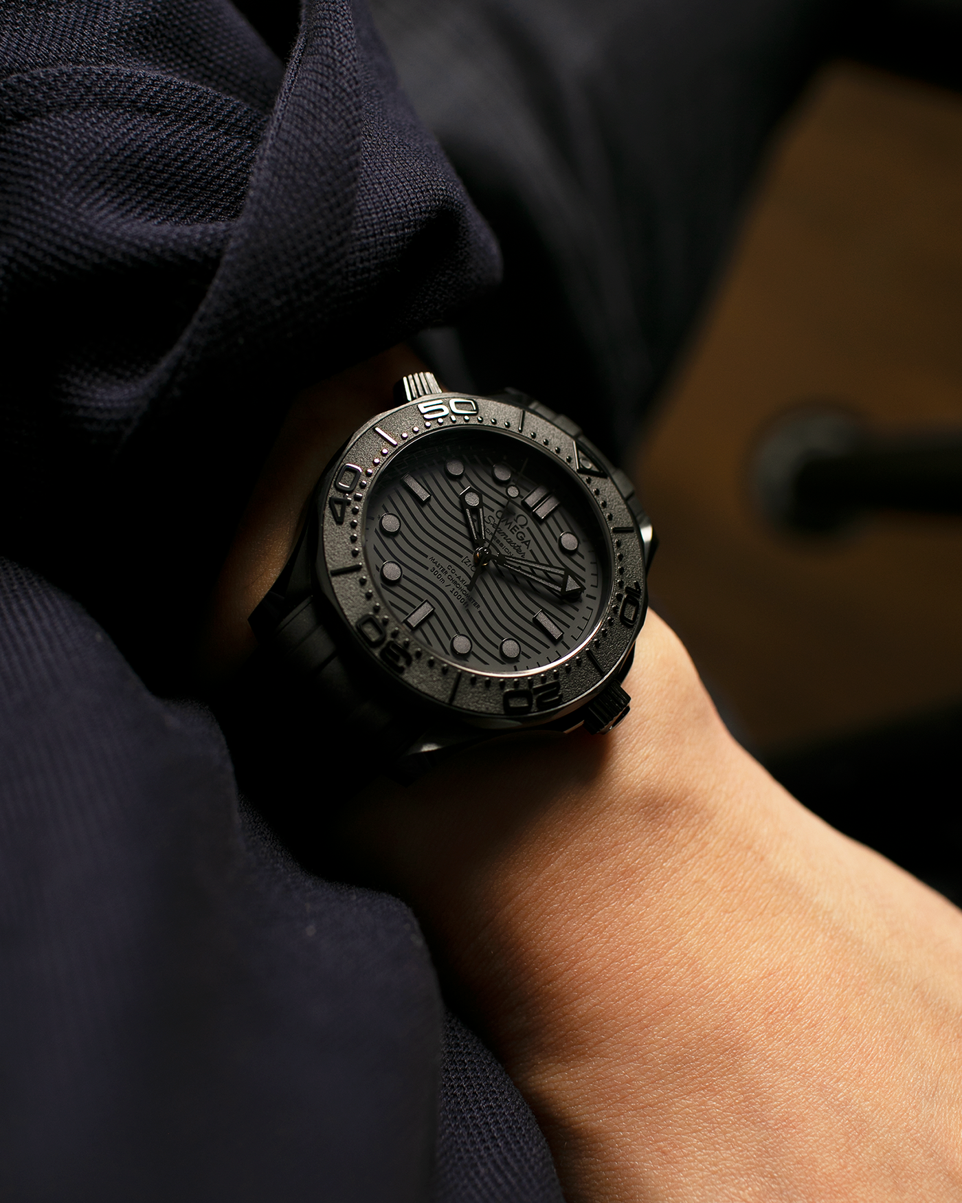 Brand: Omega
Year: 2022
Model: Seamaster 300m ‘Black Black’
Reference Number: 210.92.44.20.01.003
Material: Black Ceramic (ZrO2)
Movement: Omega Co-Axial Cal. 8806 (METAS-Certified), Self-Winding
Case Dimensions: 43.5mm x 14.47mm (51.5mm Lug-to-Lug)
Lug Width: 21mm
Strap: Omega Black Rubber Strap with Signed Ceramic Tang Buckle