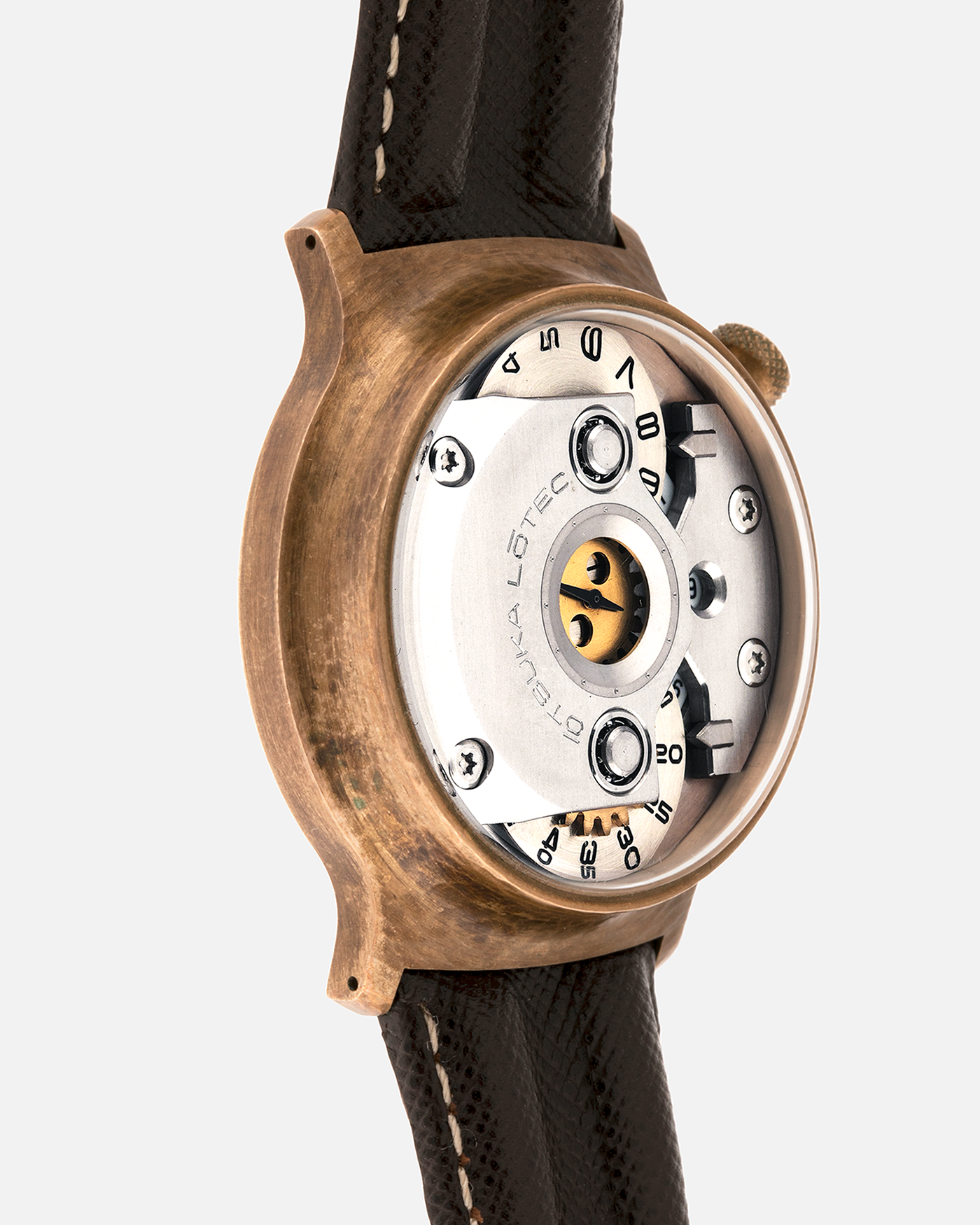 Brand: Otsuka Lotec
Year: 2020
Model: No.5 Bronze R-1 Reika
Material: Hand-Hammered Bronze with Stainless Steel Caseback
Movement: Modified Miyota Calibre 8215
Case Dimensions: 42mm Diameter 13.6mm Thickness
Strap: Brown Otsuka Lotec Leather Strap with Unsigned Otsuka Lotec Stainless Steel Tang Buckle