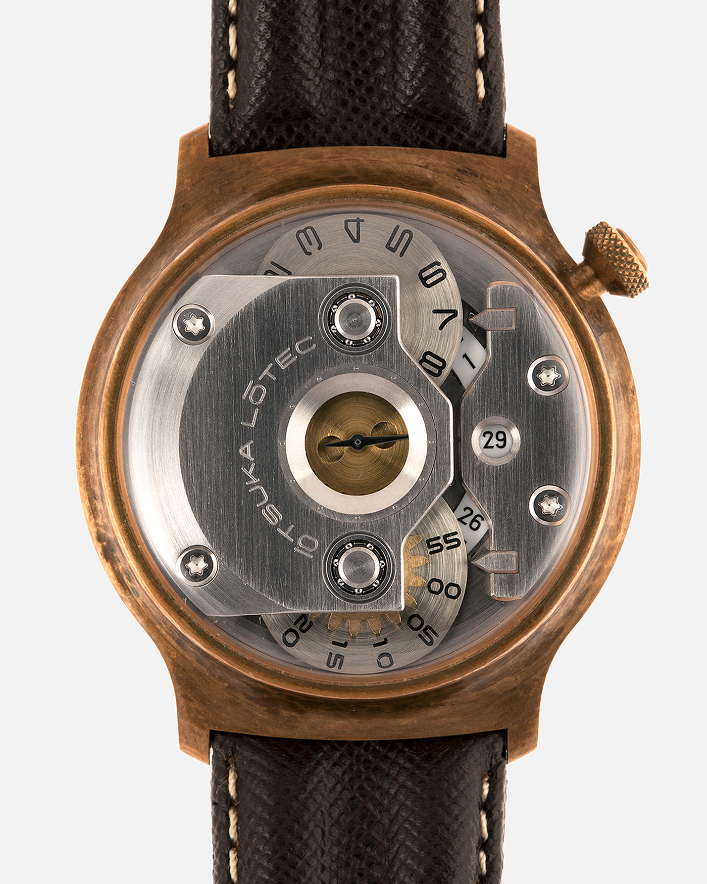 Brand: Otsuka Lotec
Year: 2020
Model: No.5 Bronze R-1 Reika
Material: Hand-Hammered Bronze with Stainless Steel Caseback
Movement: Modified Miyota Calibre 8215
Case Dimensions: 42mm Diameter 13.6mm Thickness
Strap: Brown Otsuka Lotec Leather Strap with Unsigned Otsuka Lotec Stainless Steel Tang Buckle