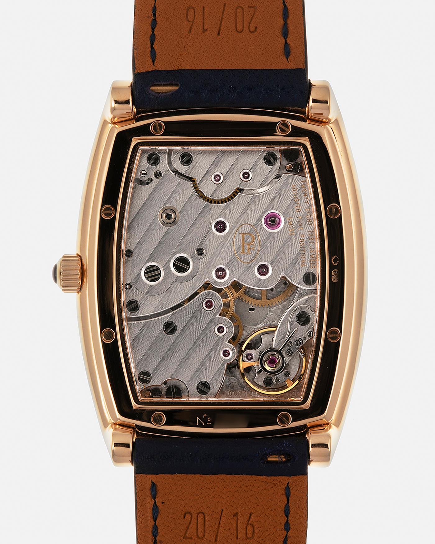 Brand: Parmigiani Fleurier
Year: 2000s
Model: Ionica Hebdomadaire 8-Days ‘Mother-of-Pearl’
Material: 18-carat Rose Gold, Mother-of-Pearl Dial
Movement: Parmigiani Fleurier Cal. PF 110, Manual-Winding
Case Dimensions: 45mm (Including Lugs) x 36mm x 11mm
Lug Width: 20mm
Strap: Nostime Dark Navy Grained Calf Leather Strap with 18-carat Rose Gold Signed Tang Buckle
