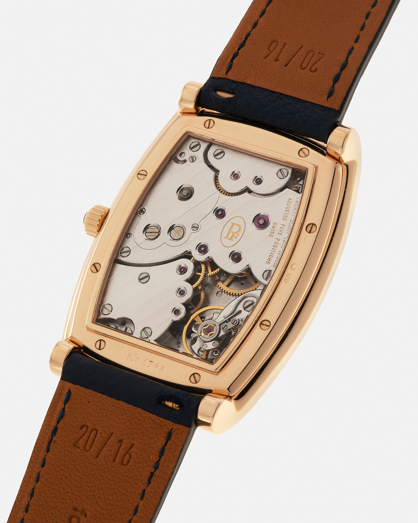 Brand: Parmigiani Fleurier
Year: 2000s
Model: Ionica Hebdomadaire 8-Days ‘Mother-of-Pearl’
Material: 18-carat Rose Gold, Mother-of-Pearl Dial
Movement: Parmigiani Fleurier Cal. PF 110, Manual-Winding
Case Dimensions: 45mm (Including Lugs) x 36mm x 11mm
Lug Width: 20mm
Strap: Nostime Dark Navy Grained Calf Leather Strap with 18-carat Rose Gold Signed Tang Buckle