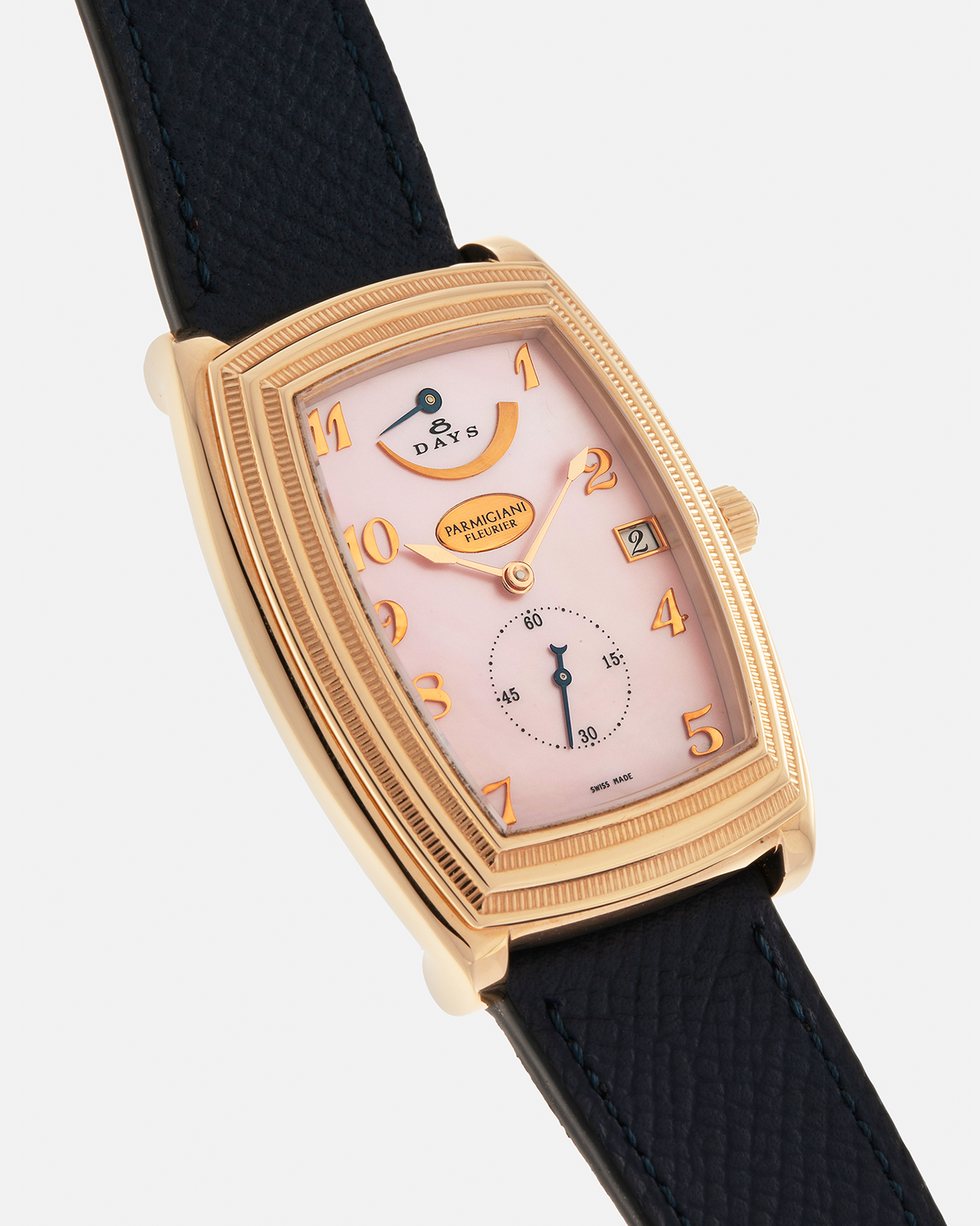 Brand: Parmigiani Fleurier
Year: 2000s
Model: Ionica Hebdomadaire 8-Days ‘Mother-of-Pearl’
Material: 18-carat Rose Gold, Mother-of-Pearl Dial
Movement: Parmigiani Fleurier Cal. PF 110, Manual-Winding
Case Dimensions: 45mm (Including Lugs) x 36mm x 11mm
Lug Width: 20mm
Strap: Nostime Dark Navy Grained Calf Leather Strap with 18-carat Rose Gold Signed Tang Buckle