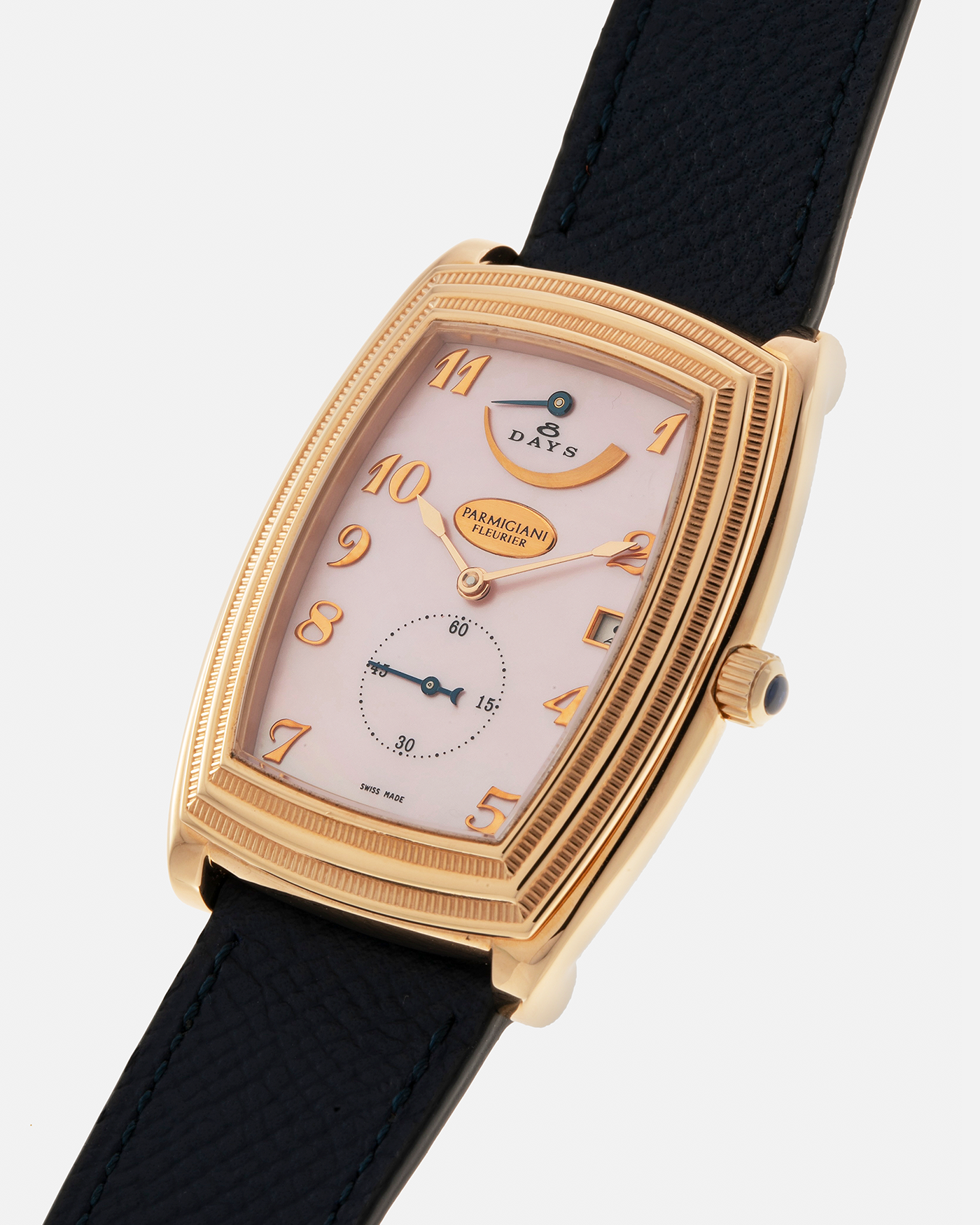 Brand: Parmigiani Fleurier
Year: 2000s
Model: Ionica Hebdomadaire 8-Days ‘Mother-of-Pearl’
Material: 18-carat Rose Gold, Mother-of-Pearl Dial
Movement: Parmigiani Fleurier Cal. PF 110, Manual-Winding
Case Dimensions: 45mm (Including Lugs) x 36mm x 11mm
Lug Width: 20mm
Strap: Nostime Dark Navy Grained Calf Leather Strap with 18-carat Rose Gold Signed Tang Buckle