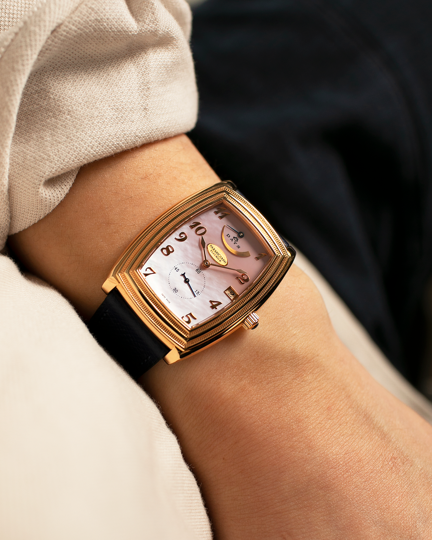 Brand: Parmigiani Fleurier
Year: 2000s
Model: Ionica Hebdomadaire 8-Days ‘Mother-of-Pearl’
Material: 18-carat Rose Gold, Mother-of-Pearl Dial
Movement: Parmigiani Fleurier Cal. PF 110, Manual-Winding
Case Dimensions: 45mm (Including Lugs) x 36mm x 11mm
Lug Width: 20mm
Strap: Nostime Dark Navy Grained Calf Leather Strap with 18-carat Rose Gold Signed Tang Buckle