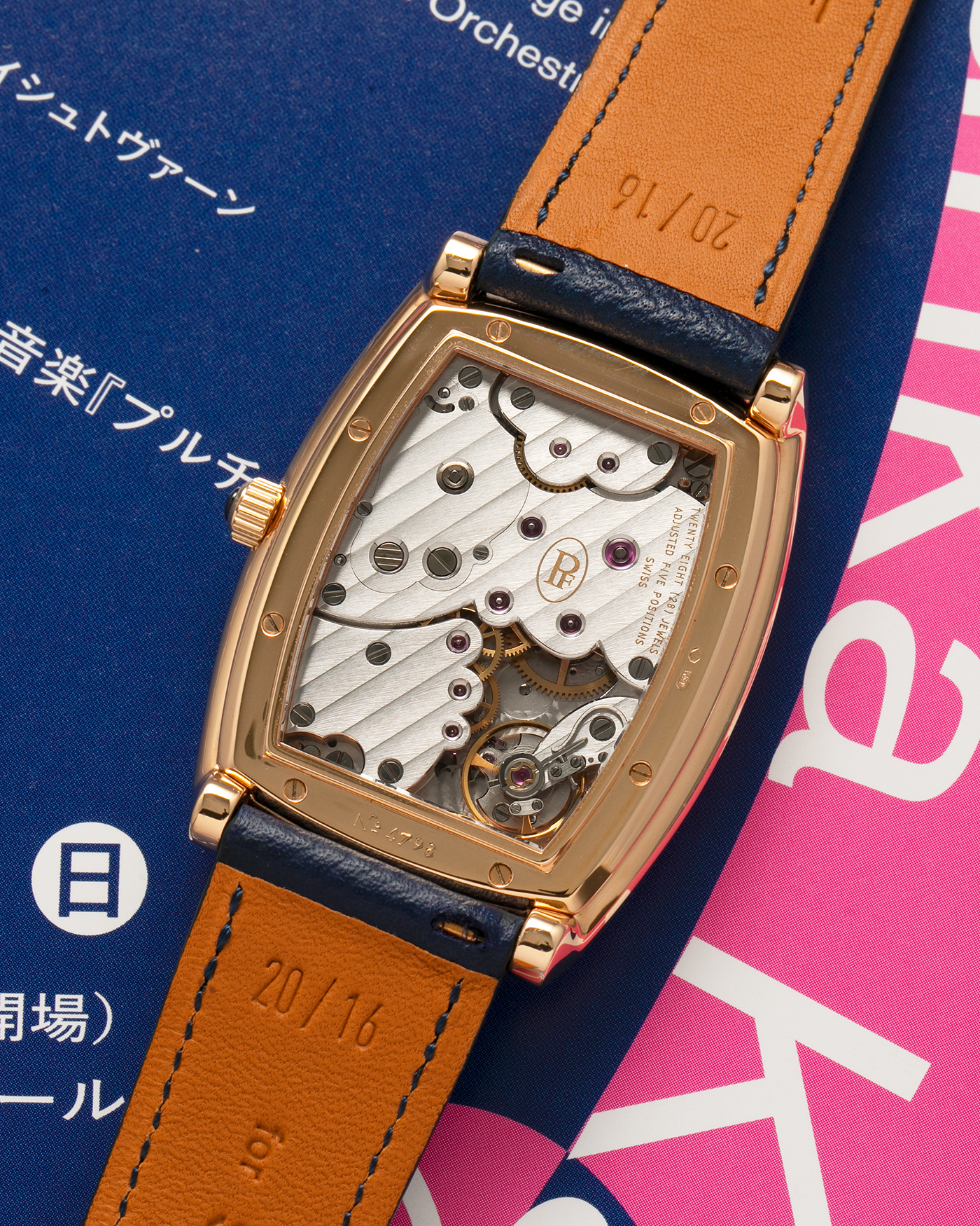 Brand: Parmigiani Fleurier
Year: 2000s
Model: Ionica Hebdomadaire 8-Days ‘Mother-of-Pearl’
Material: 18-carat Rose Gold, Mother-of-Pearl Dial
Movement: Parmigiani Fleurier Cal. PF 110, Manual-Winding
Case Dimensions: 45mm (Including Lugs) x 36mm x 11mm
Lug Width: 20mm
Strap: Nostime Dark Navy Grained Calf Leather Strap with 18-carat Rose Gold Signed Tang Buckle