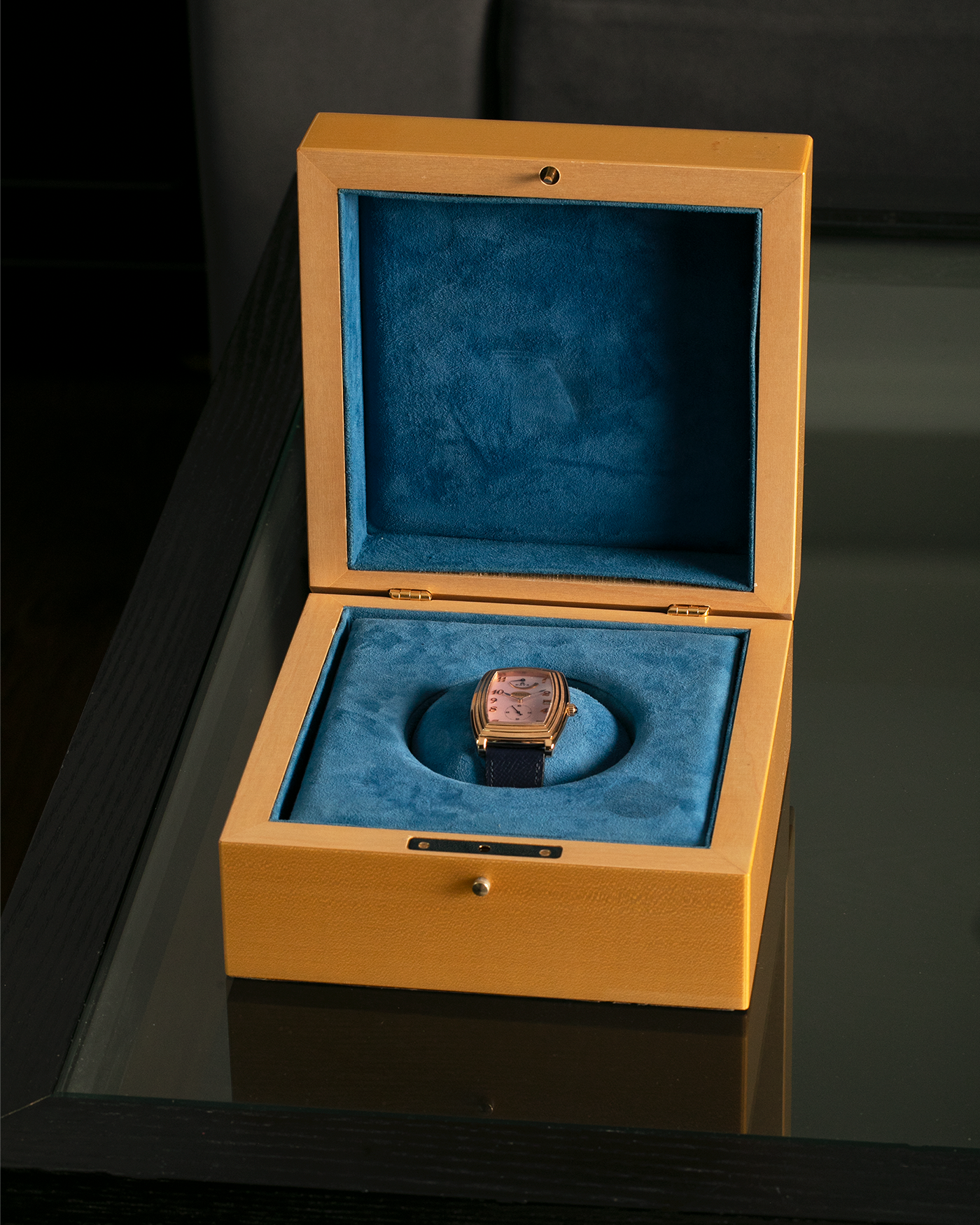 Brand: Parmigiani Fleurier
Year: 2000s
Model: Ionica Hebdomadaire 8-Days ‘Mother-of-Pearl’
Material: 18-carat Rose Gold, Mother-of-Pearl Dial
Movement: Parmigiani Fleurier Cal. PF 110, Manual-Winding
Case Dimensions: 45mm (Including Lugs) x 36mm x 11mm
Lug Width: 20mm
Strap: Nostime Dark Navy Grained Calf Leather Strap with 18-carat Rose Gold Signed Tang Buckle
