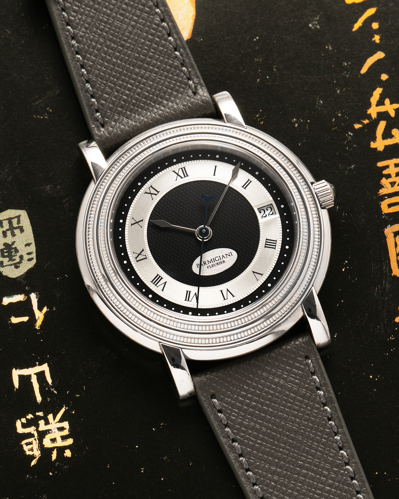 Brand: Parmigiani Fleurier
Year: 2000’s
Model: Toric Automatic
Material: Platinum 950
Movement: PF Cal. 13301, Self-Winding
Case Dimensions: 40mm Diameter 8.5mm Thickness
Lug Width: 20mm
Strap: Grey Molequin Textured Calf Strap with Signed Platinum Parmigiani Fleurier Tang Buckle. Additional Used Black Parmigiani Fleurier Alligator Strap